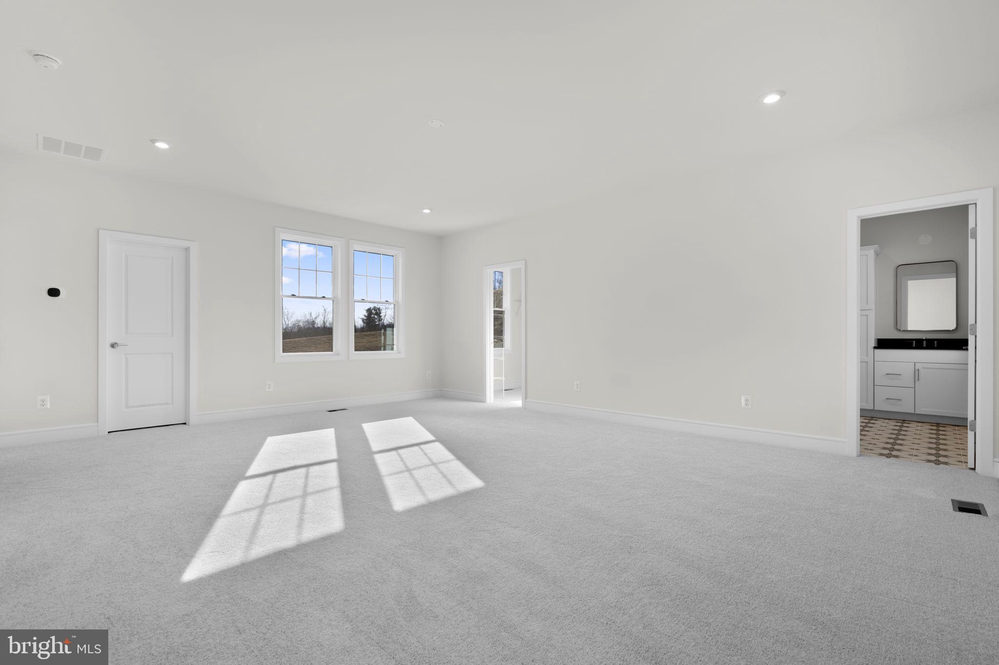 2611 Blue Rdg Avenue, Unit HOMESITE 139 Marshall, VA 20115 - Photo 28 of 49 an empty room with windows and way to kitchen