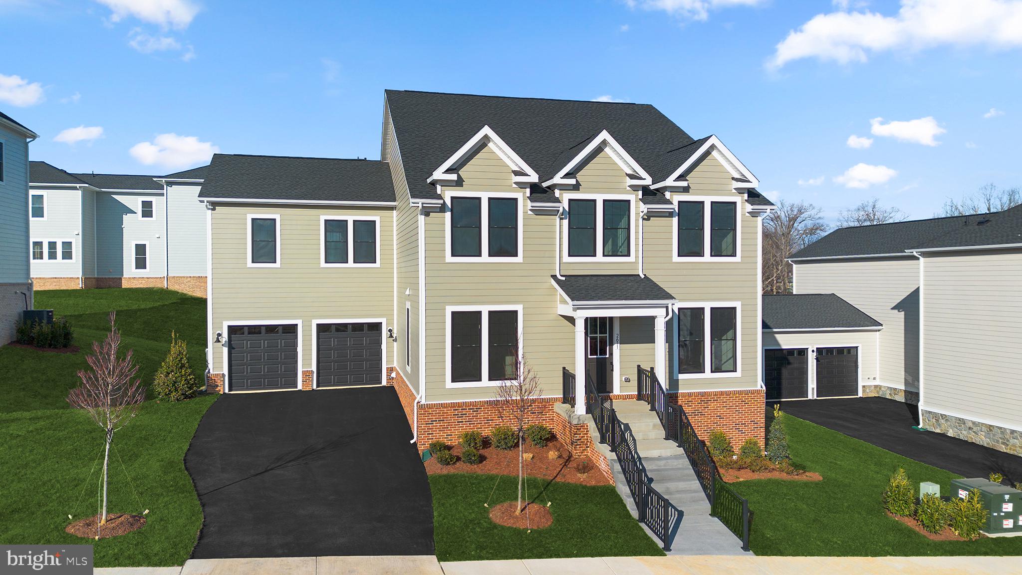 2611 Blue Rdg Avenue, Unit HOMESITE 139 Marshall, VA 20115 - Photo 34 of 49 a front view of a house with a yard