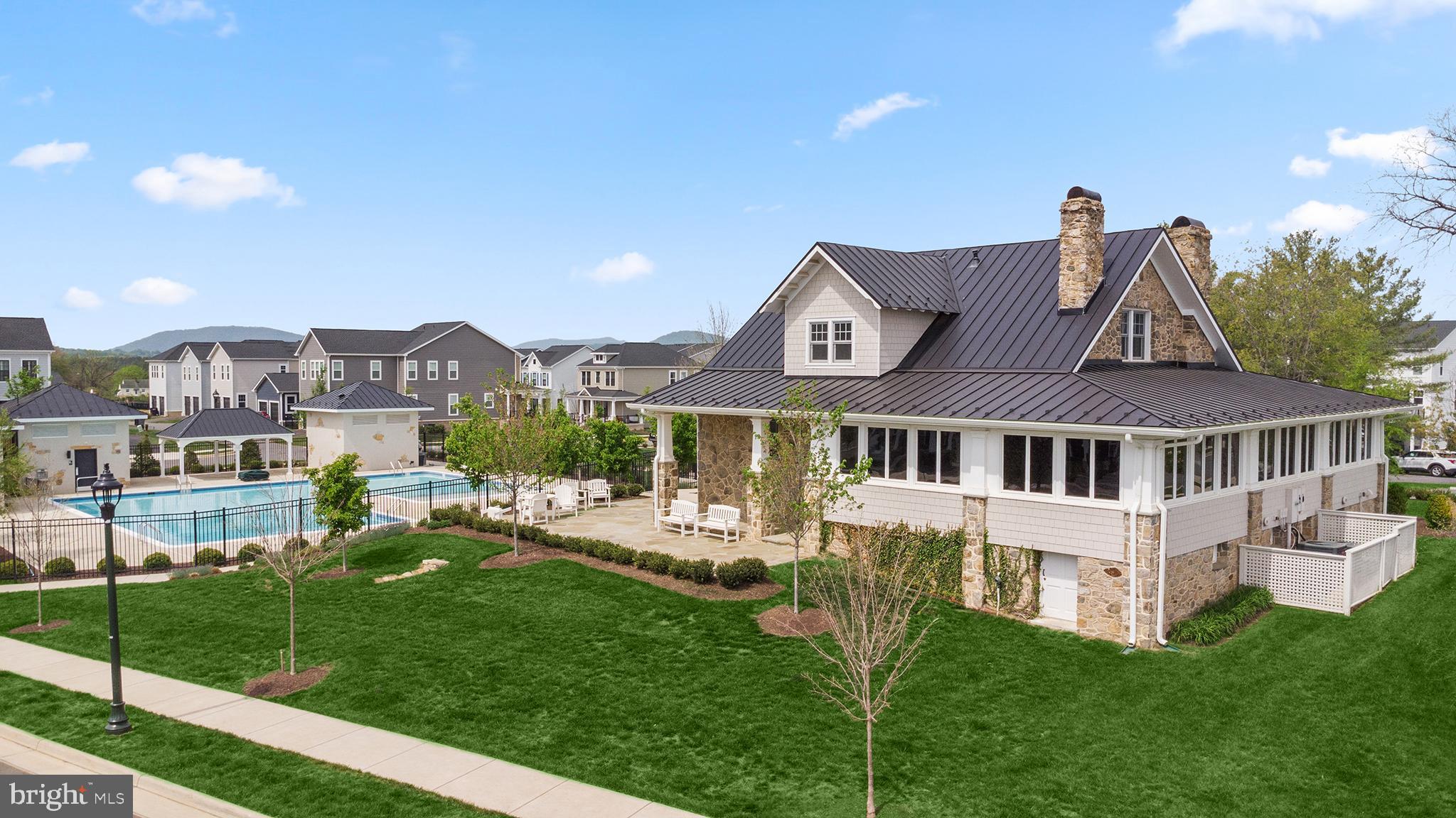 2611 Blue Rdg Avenue, Unit HOMESITE 139 Marshall, VA 20115 - Photo 40 of 49 a front view of a house with a garden