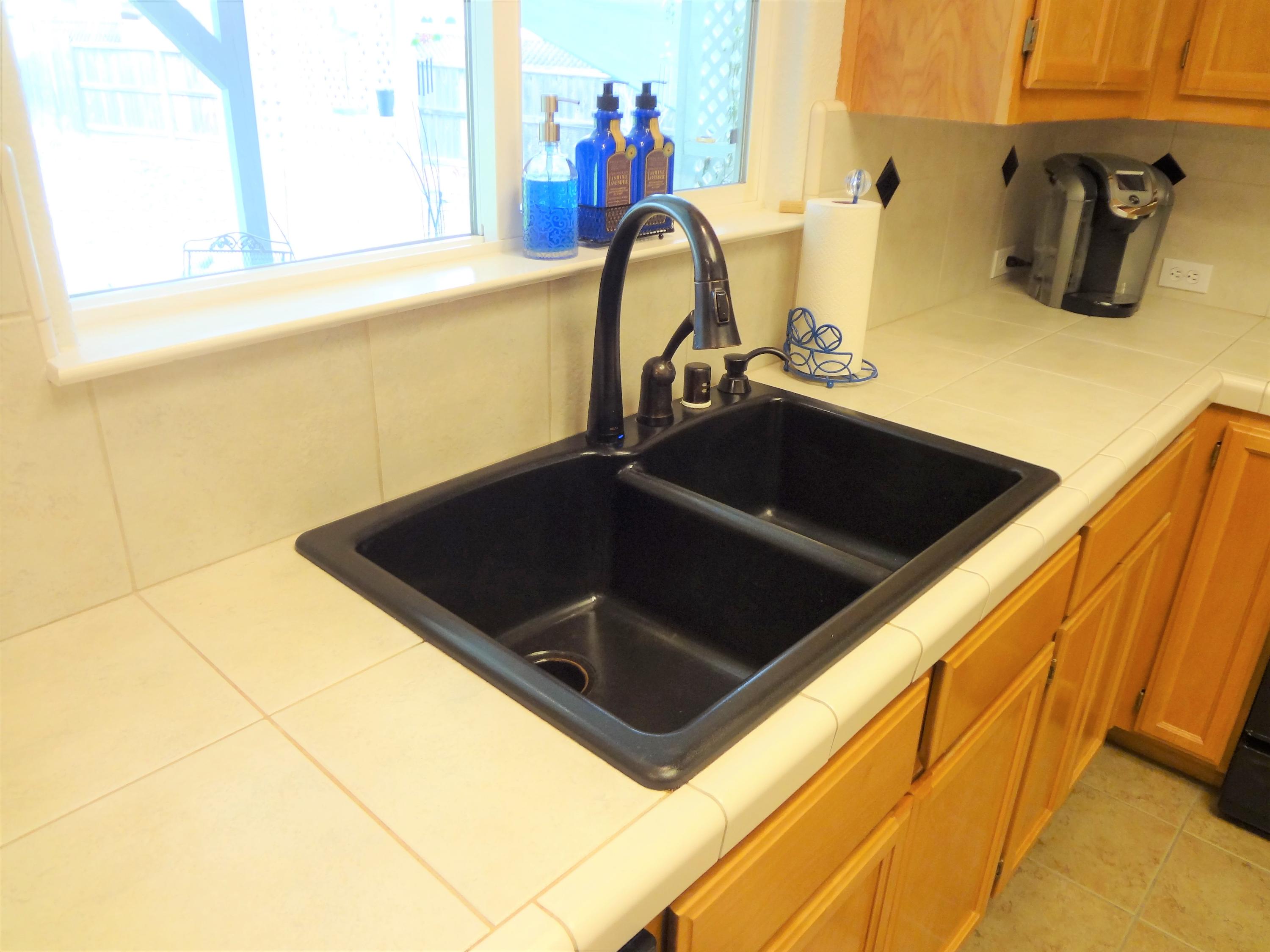 7759 Pit Road Redding, CA 96001 - Photo 12 of 47 a close view of sink and tap