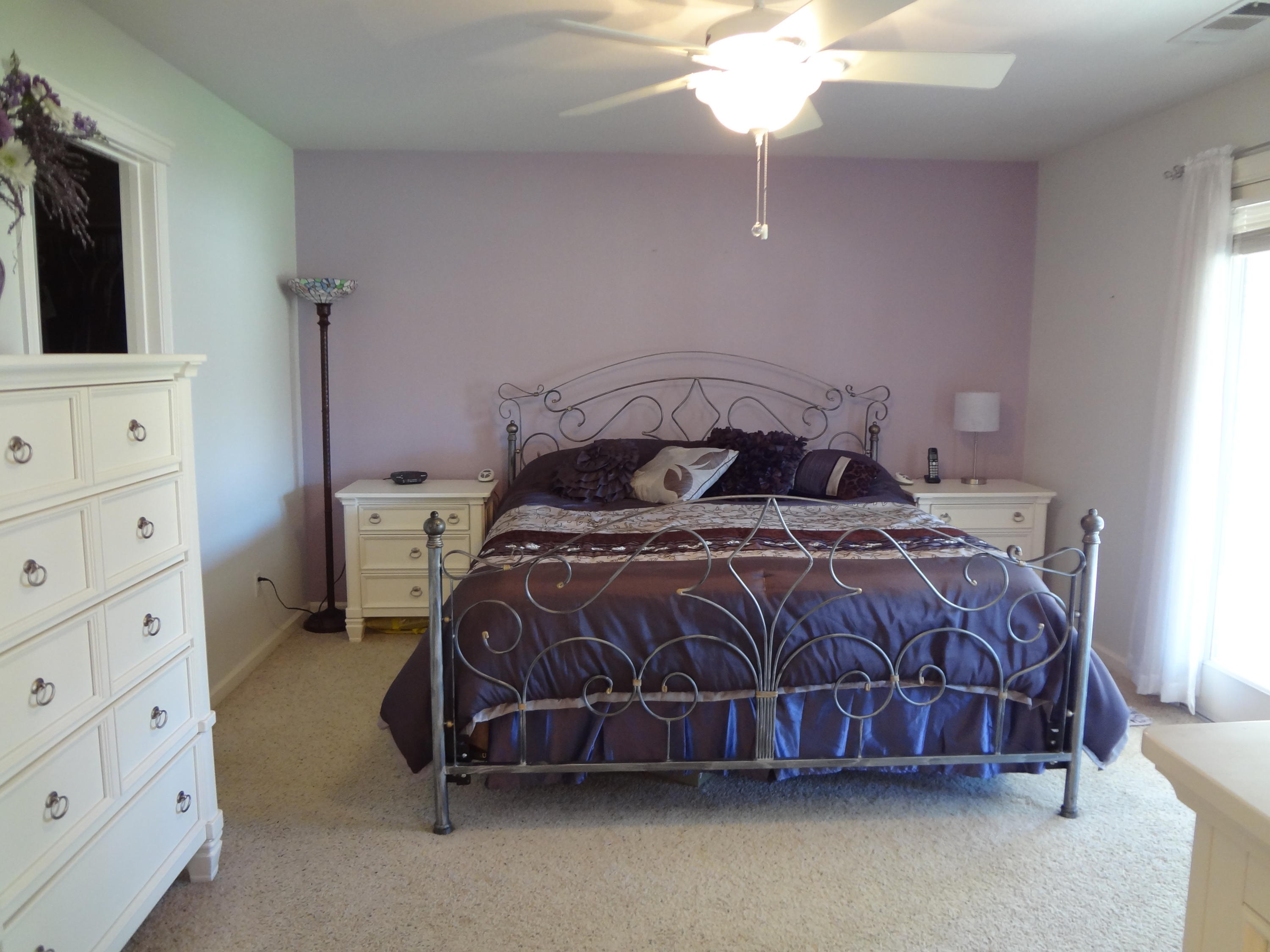 7759 Pit Road Redding, CA 96001 - Photo 18 of 47 a bedroom with a bed and a flat tv screen on dresser