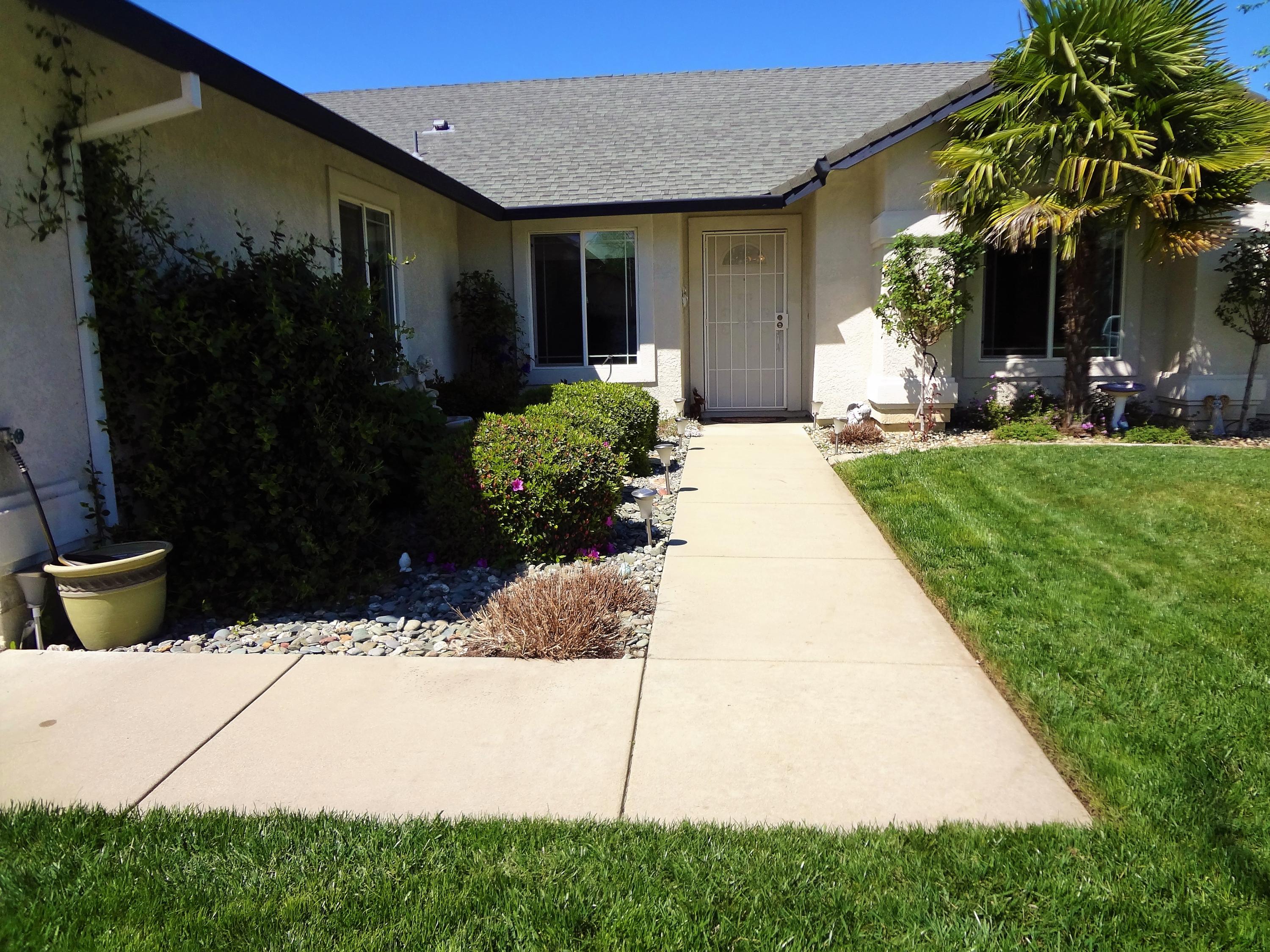 7759 Pit Road Redding, CA 96001 - Photo 2 of 47 a view of a house with potted plants