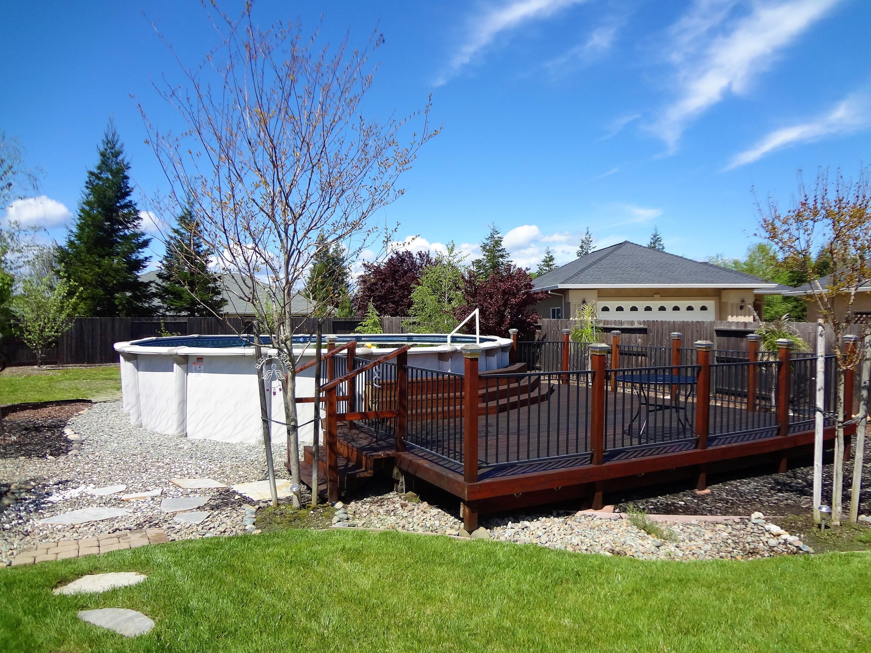 7759 Pit Road Redding, CA 96001 - Photo 31 of 47 a view of a deck with a fence