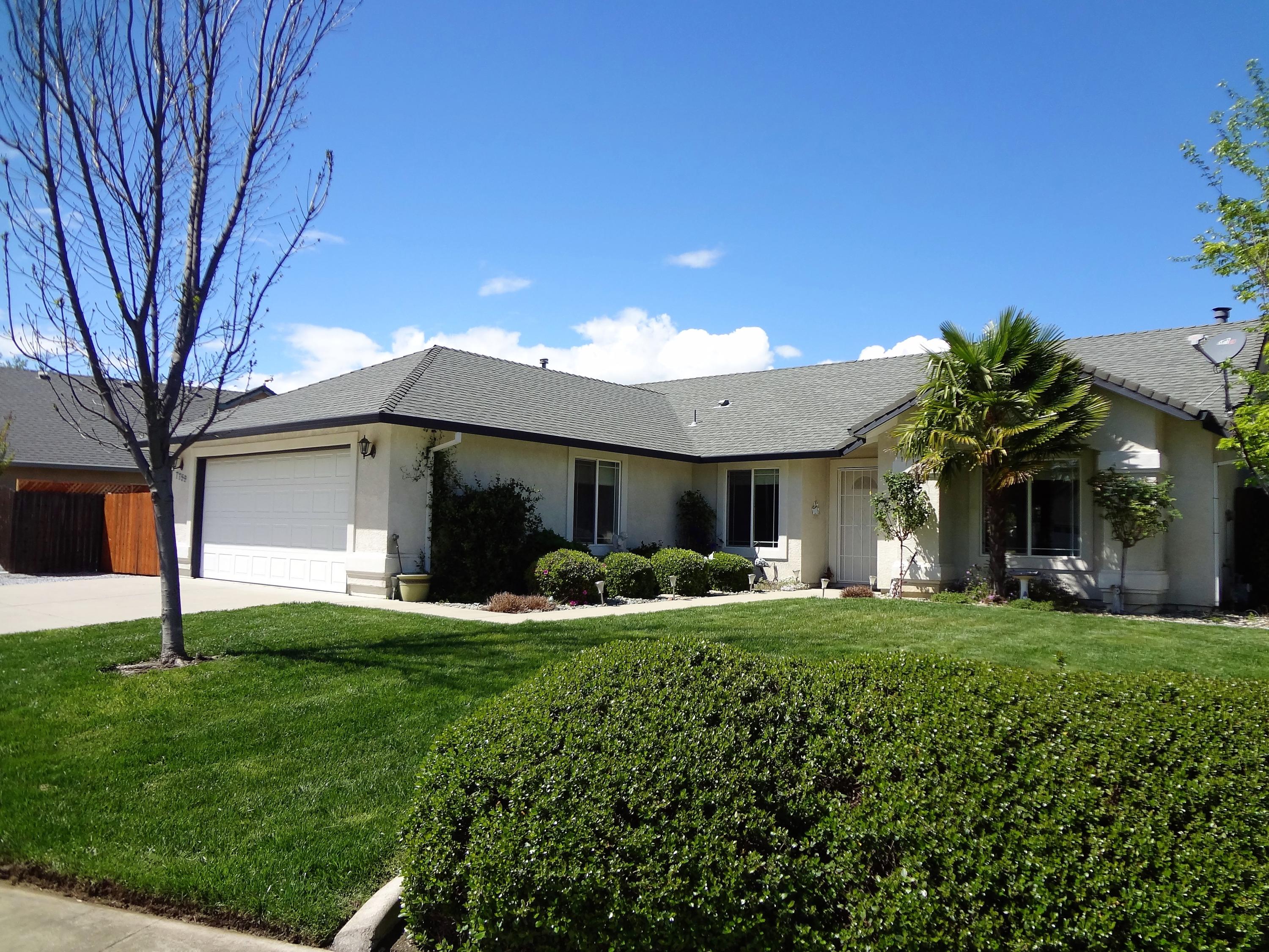 7759 Pit Road Redding, CA 96001 - Photo 47 of 47 a view of a house with a yard and tree s