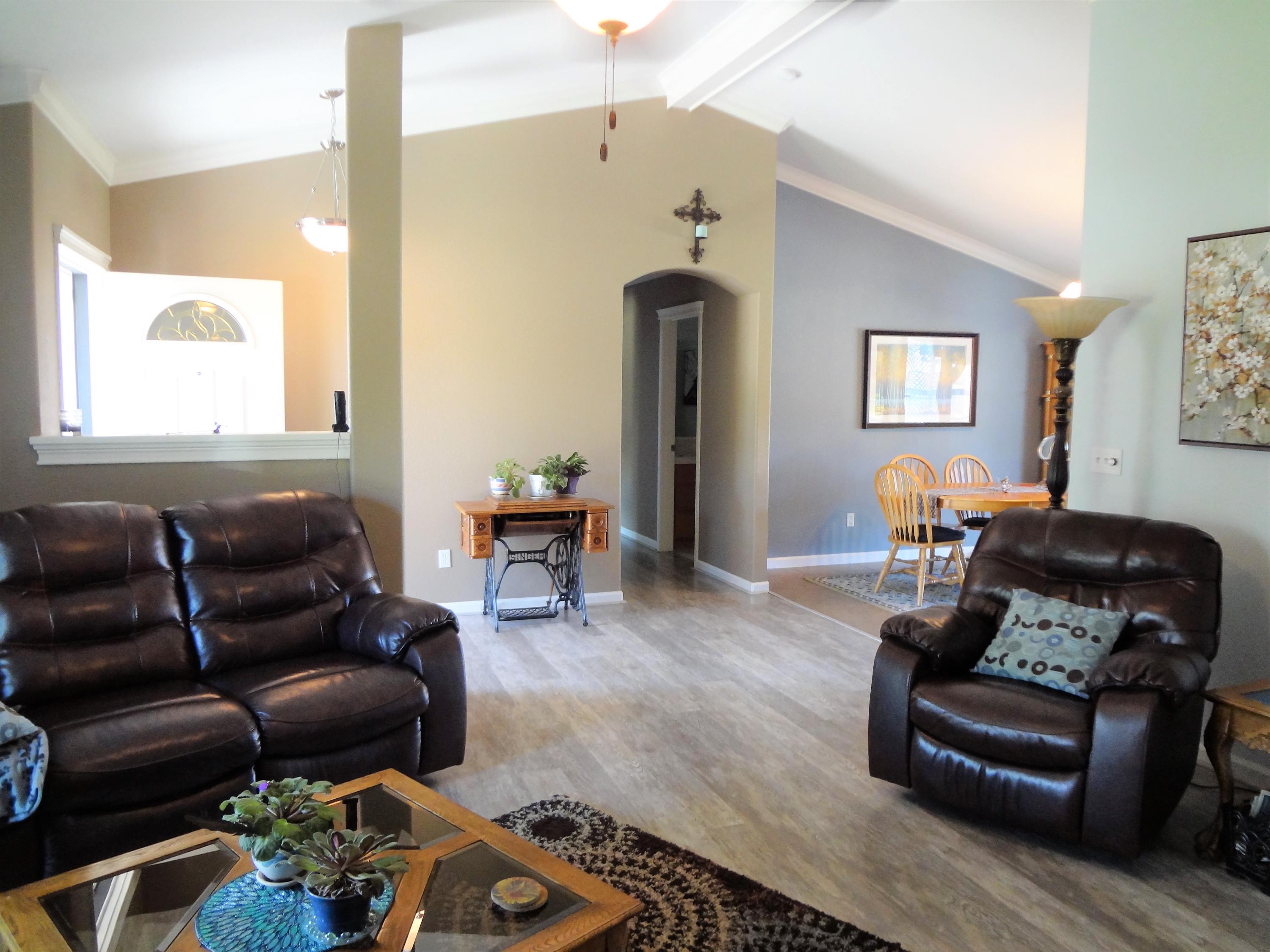 7759 Pit Road Redding, CA 96001 - Photo 7 of 47 a living room with furniture and a window