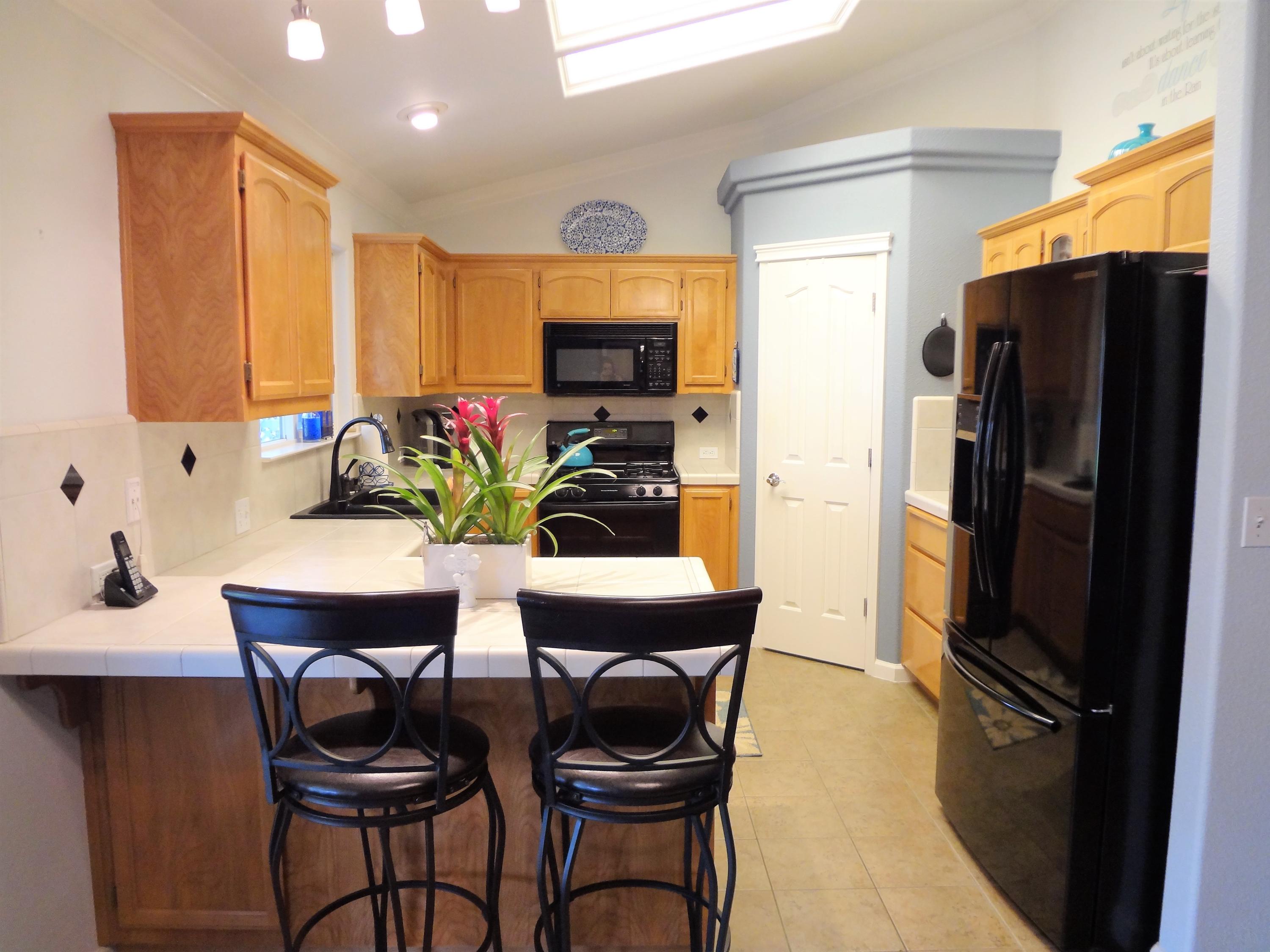 7759 Pit Road Redding, CA 96001 - Photo 8 of 47 a view of a dining room with furniture