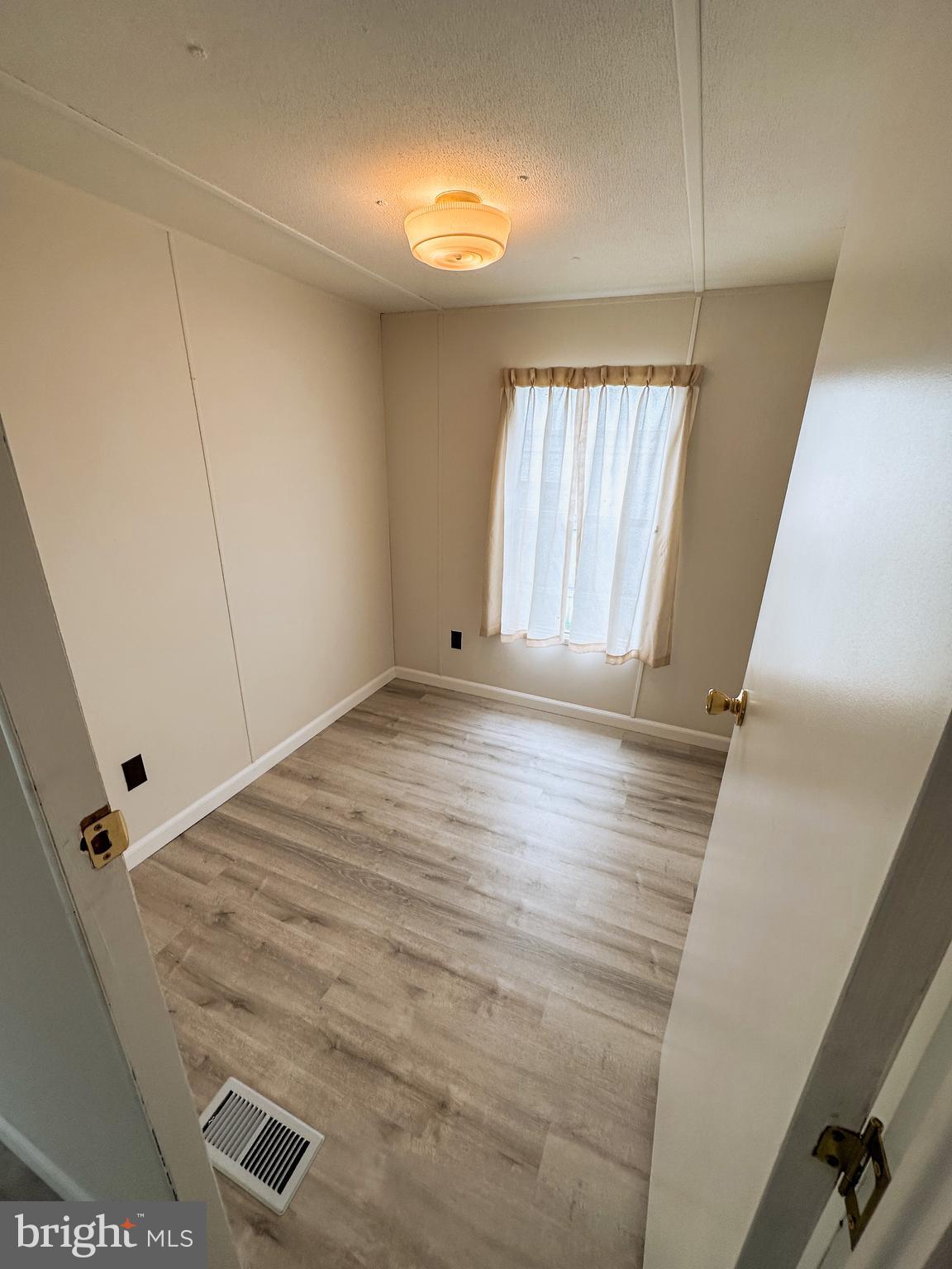 600 Convent Road, Unit 3 Aston, PA 19014 - Photo 5 of 7 a view of an empty room with a window