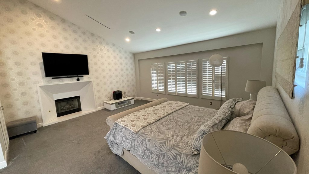 780 Gloucester Lane Thousand Oaks, CA 91362 - Photo 11 of 32 a bedroom with a bed and a television