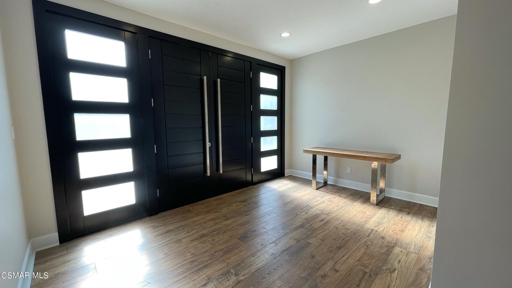 780 Gloucester Lane Thousand Oaks, CA 91362 - Photo 2 of 32 wooden floor in an empty room with a window