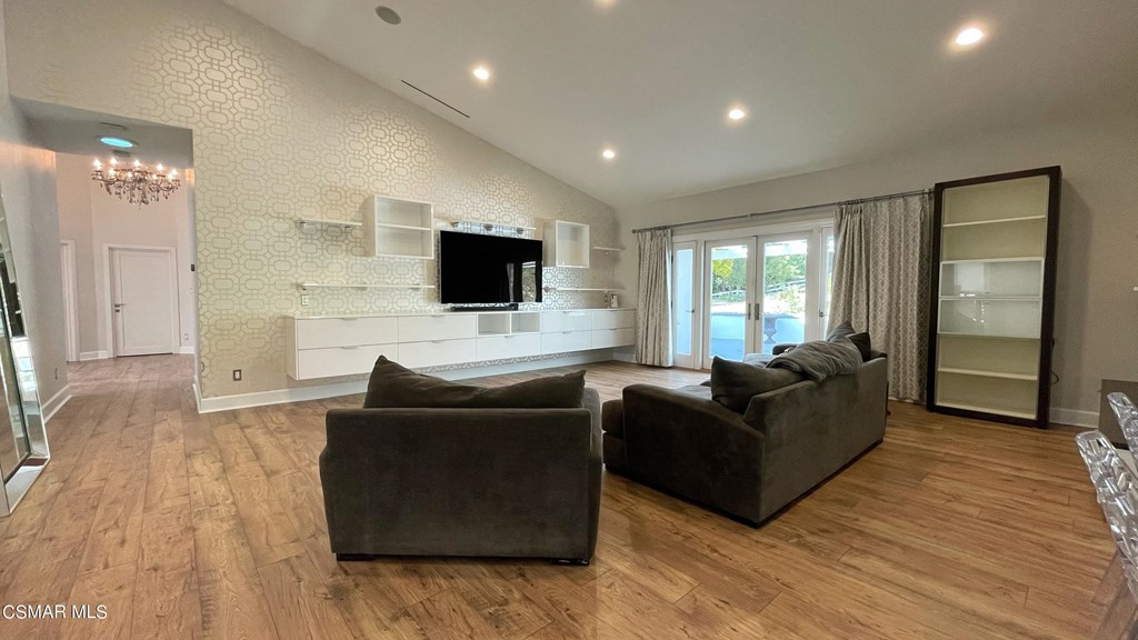 780 Gloucester Lane Thousand Oaks, CA 91362 - Photo 9 of 32 a living room with furniture and a flat screen tv