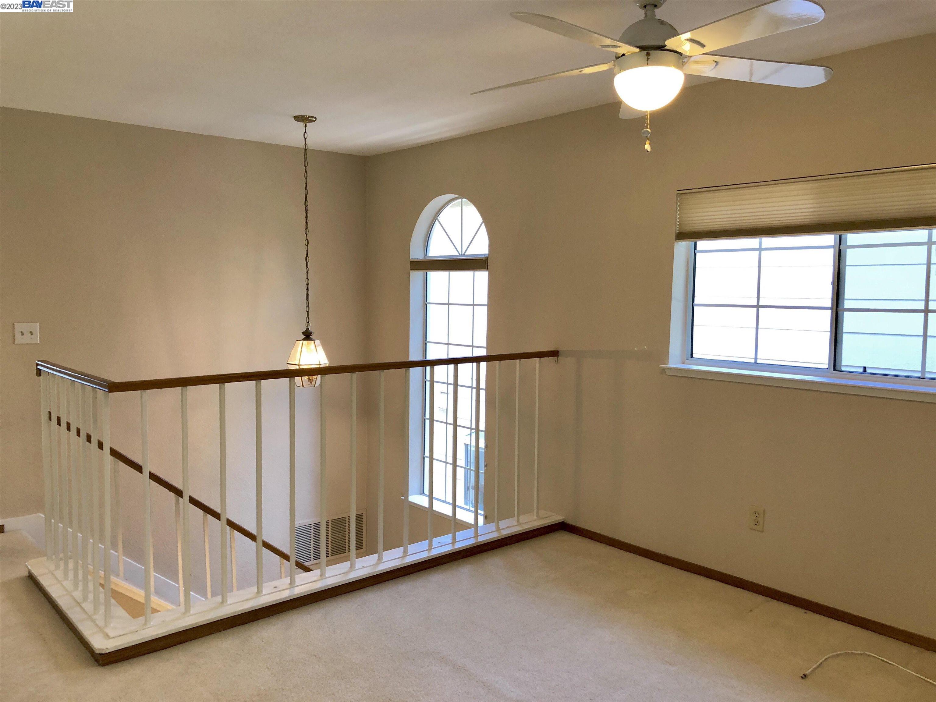 3047 Badger Drive Pleasanton, CA 94566 - Photo 12 of 18 a view of entryway and hall with wooden floor