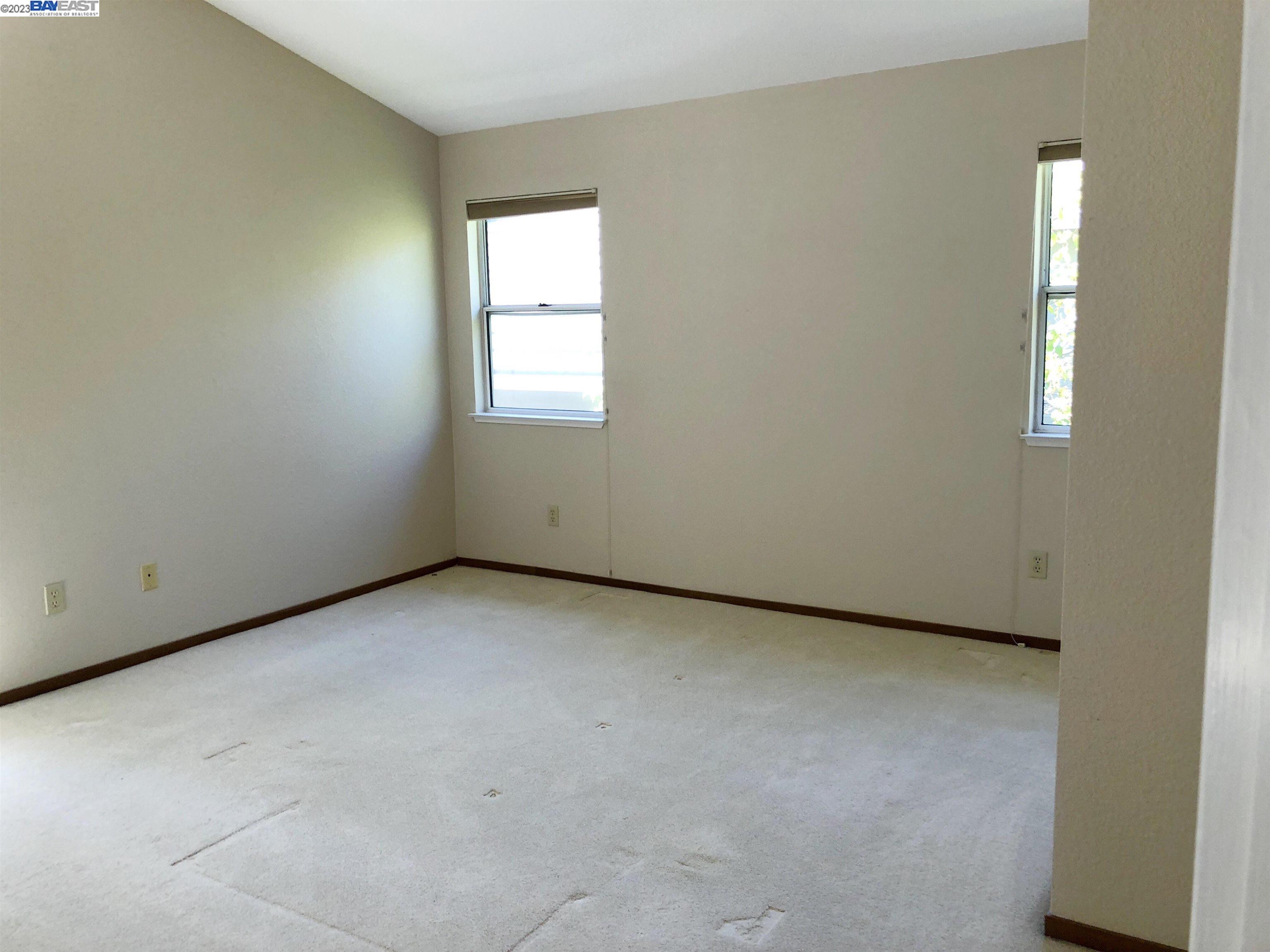 3047 Badger Drive Pleasanton, CA 94566 - Photo 14 of 18 an empty room with windows