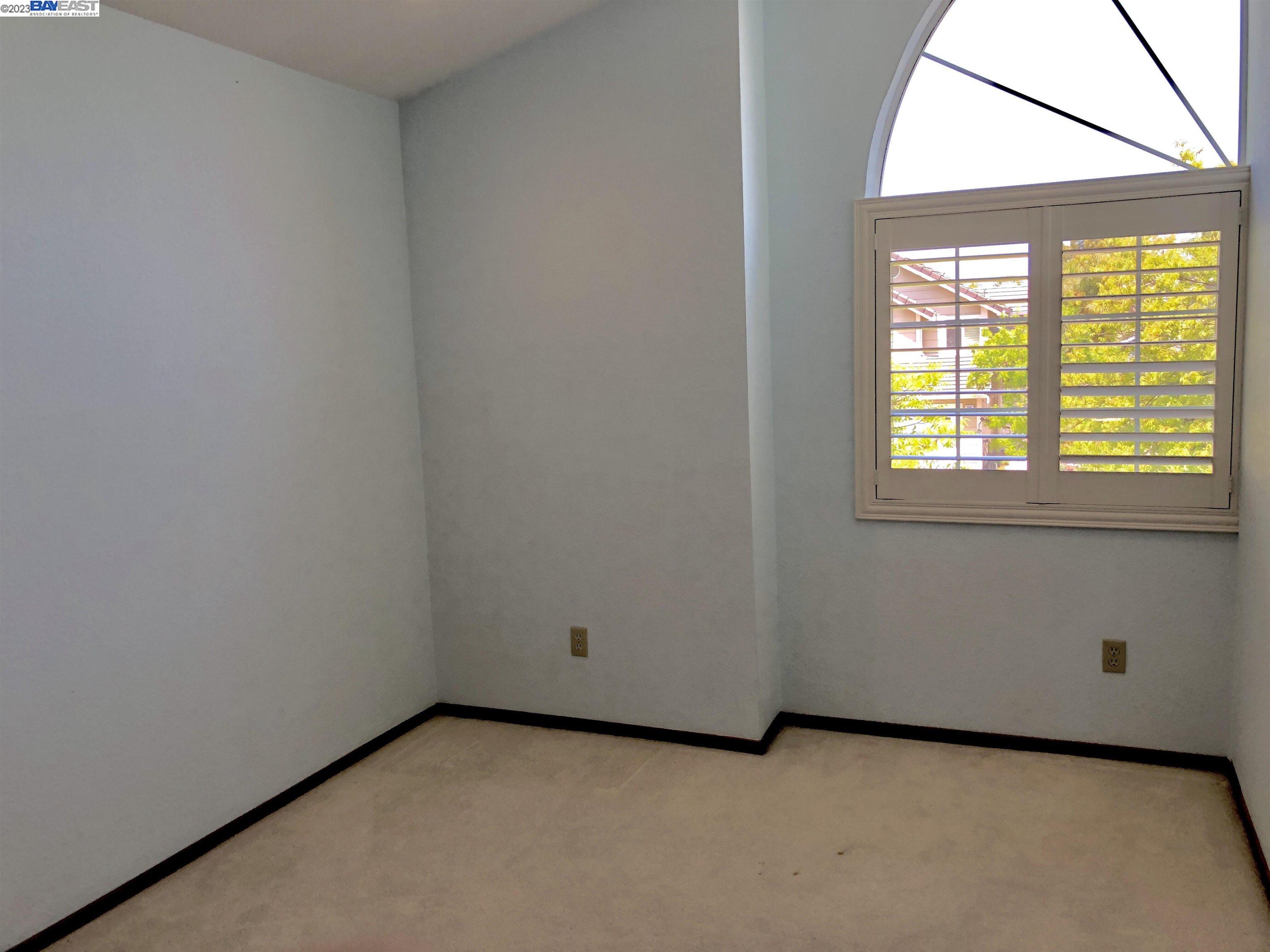 3047 Badger Drive Pleasanton, CA 94566 - Photo 15 of 18 a view of an empty room with a window