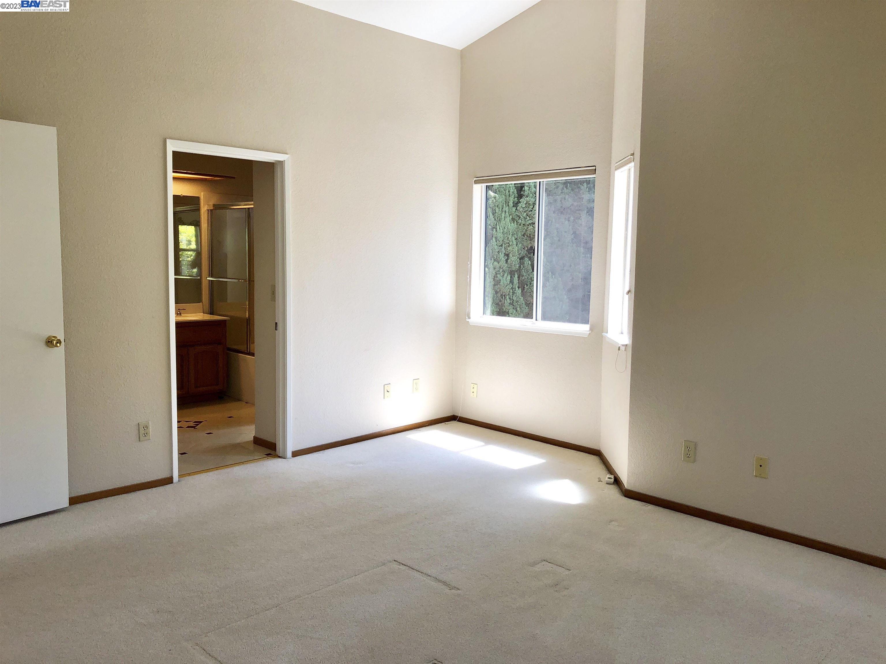 3047 Badger Drive Pleasanton, CA 94566 - Photo 17 of 18 an empty room with windows