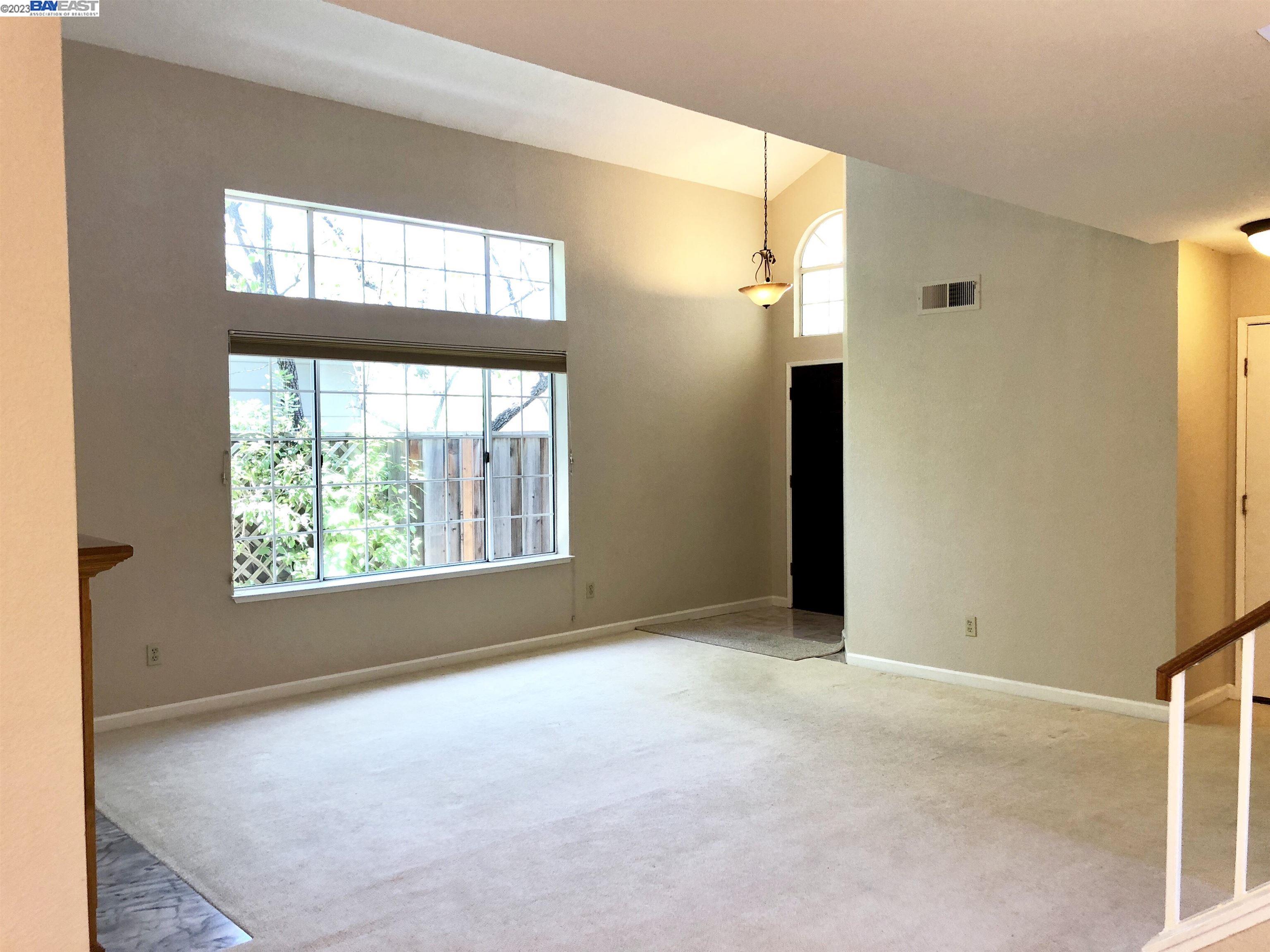 3047 Badger Drive Pleasanton, CA 94566 - Photo 7 of 18 a view of an empty room with a window