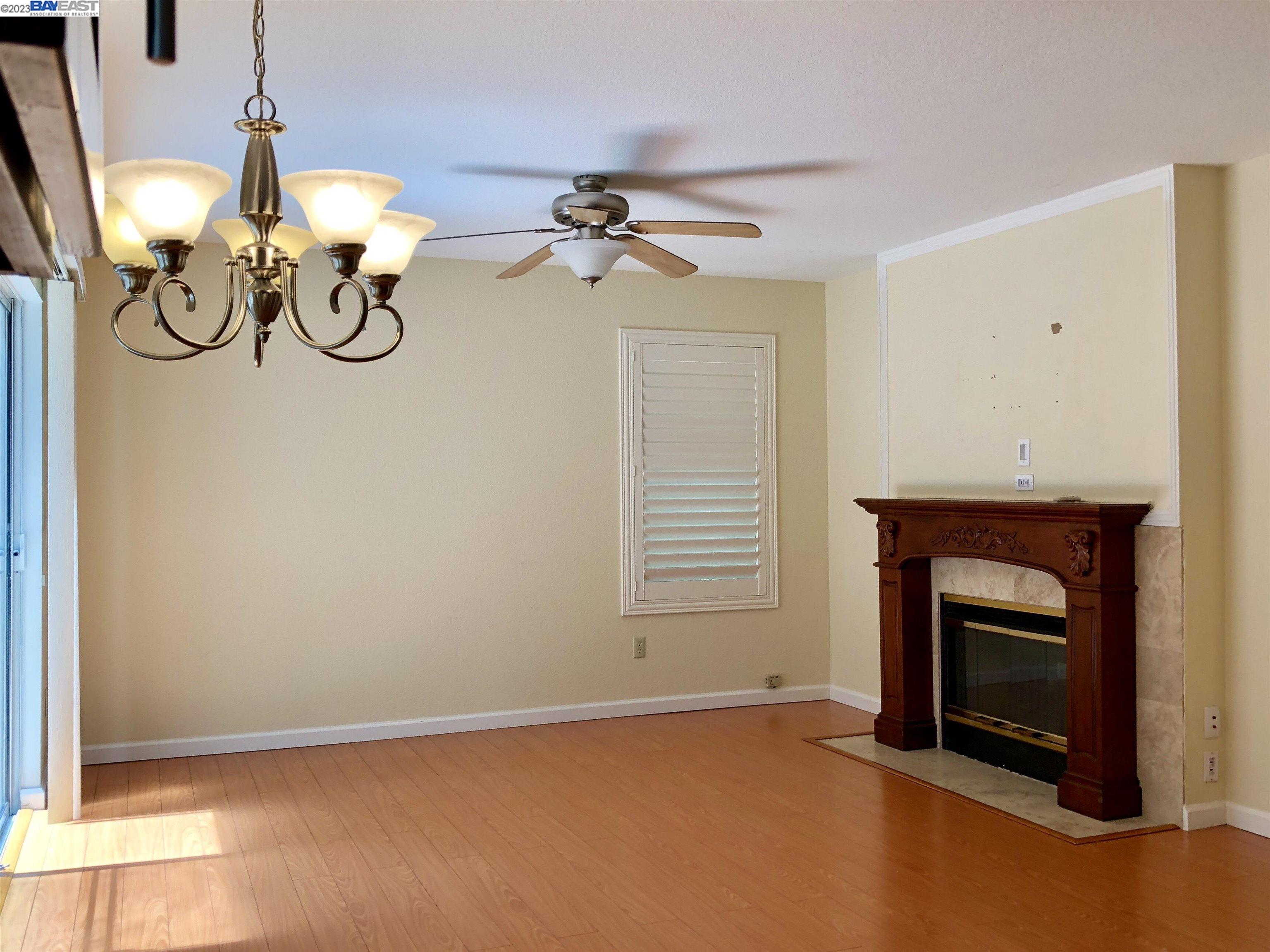 3047 Badger Drive Pleasanton, CA 94566 - Photo 9 of 18 a view of empty room with a fireplace