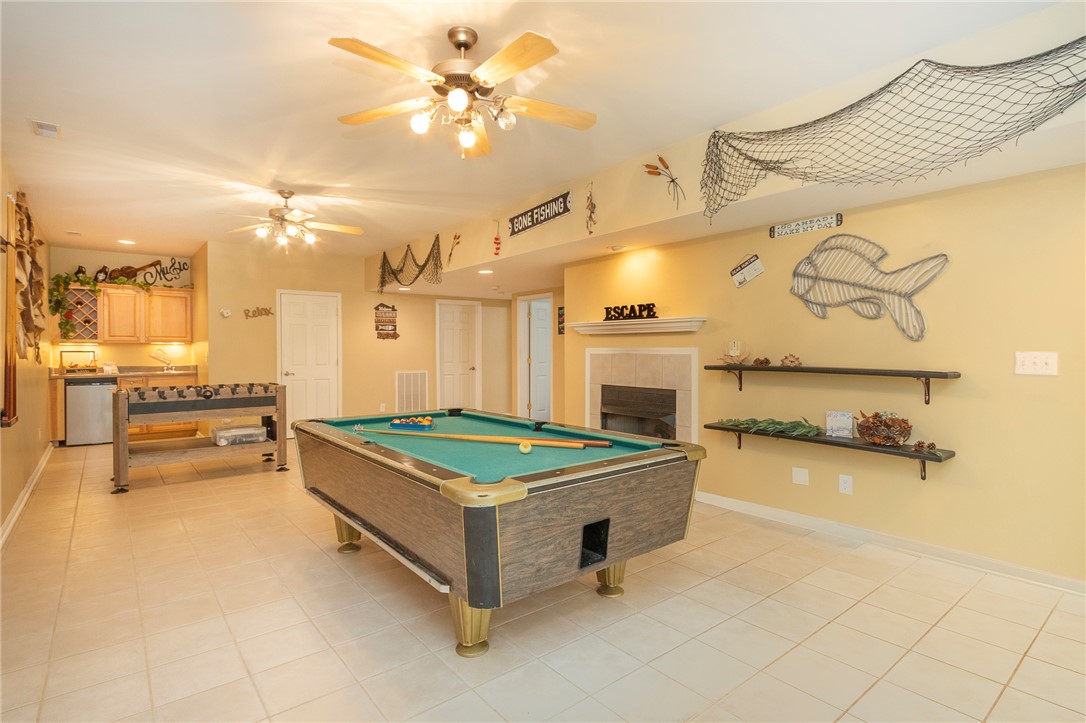 125 Inlet Pointe Drive Anderson, SC 29625 - Photo 30 of 39 A vibrant recreation room offering diverse entertainment, perfect for lively gatherings.