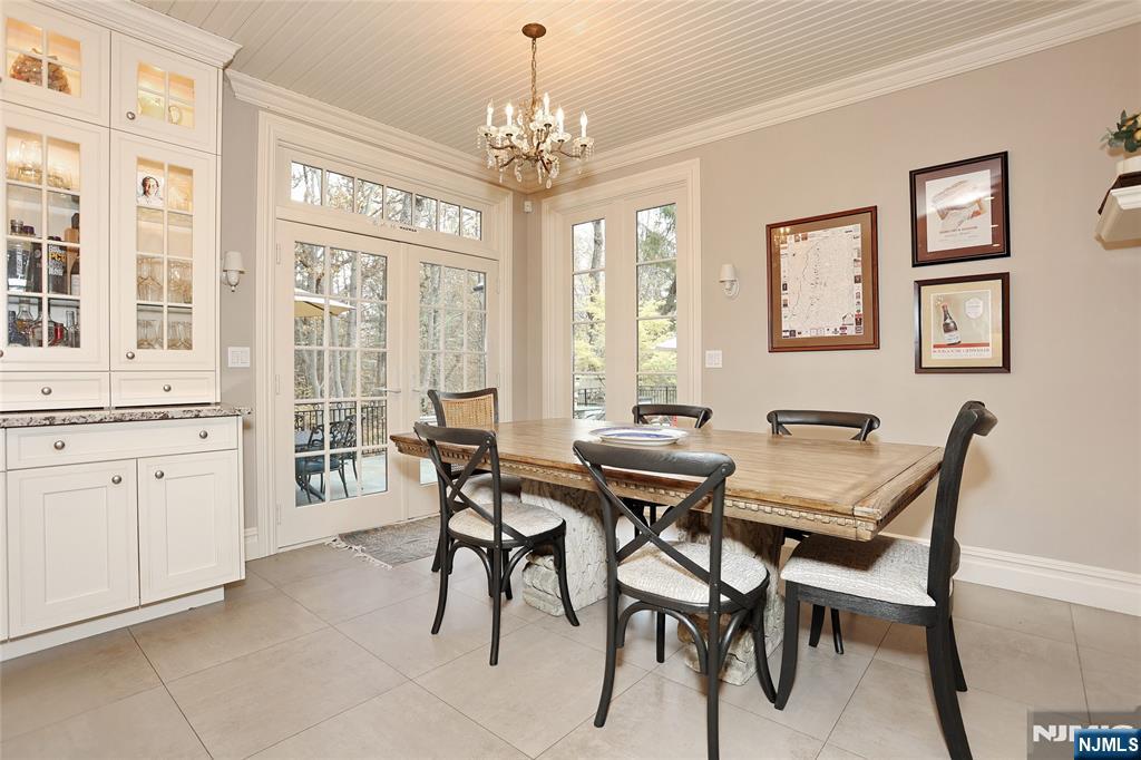 164 Deerhaven Road Mahwah, NJ 07430 - Photo 18 of 42 a view of a dining room with furniture and chandelier