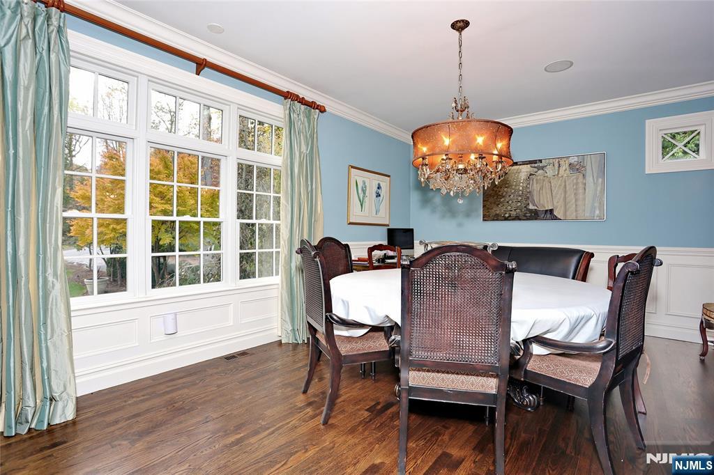 164 Deerhaven Road Mahwah, NJ 07430 - Photo 21 of 42 a view of a dining room with furniture window and wooden floor