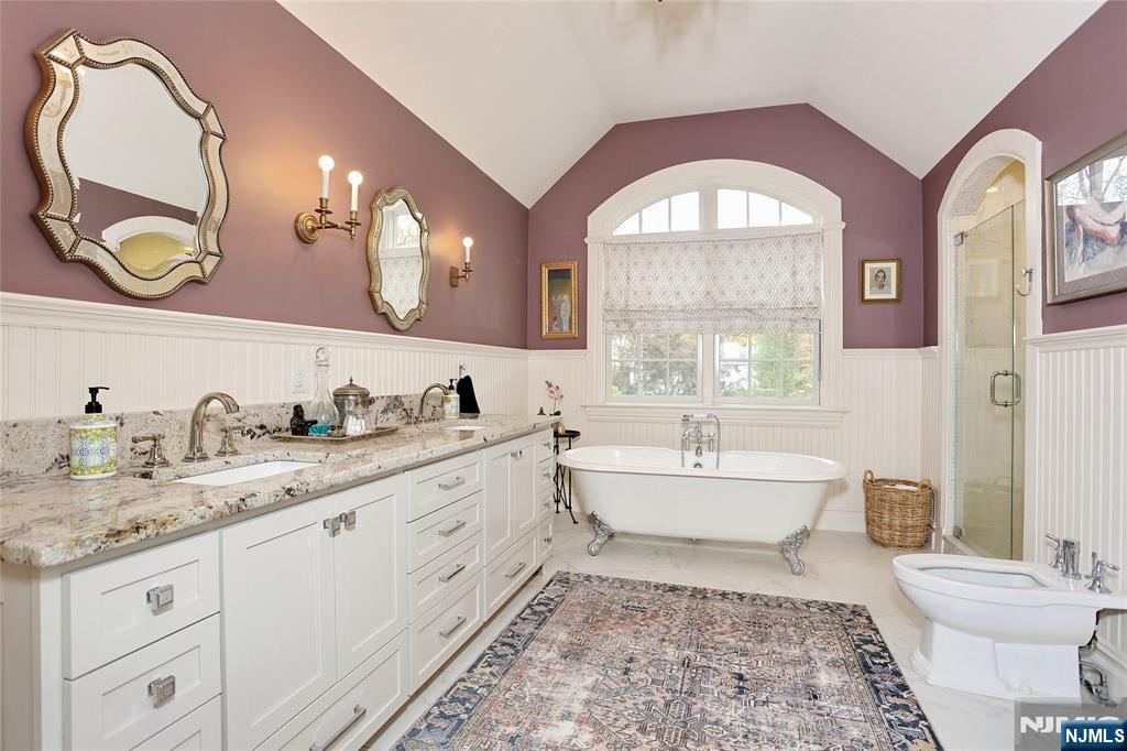 164 Deerhaven Road Mahwah, NJ 07430 - Photo 25 of 42 a spacious bathroom with a double vanity sink and a mirror