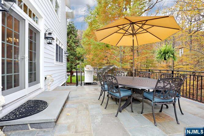 164 Deerhaven Road Mahwah, NJ 07430 - Photo 33 of 42 a view of a dinning table and chairs in the patio