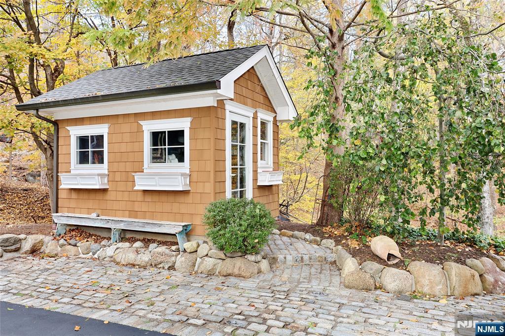 164 Deerhaven Road Mahwah, NJ 07430 - Photo 39 of 42 a view of a chairs and table in backyard