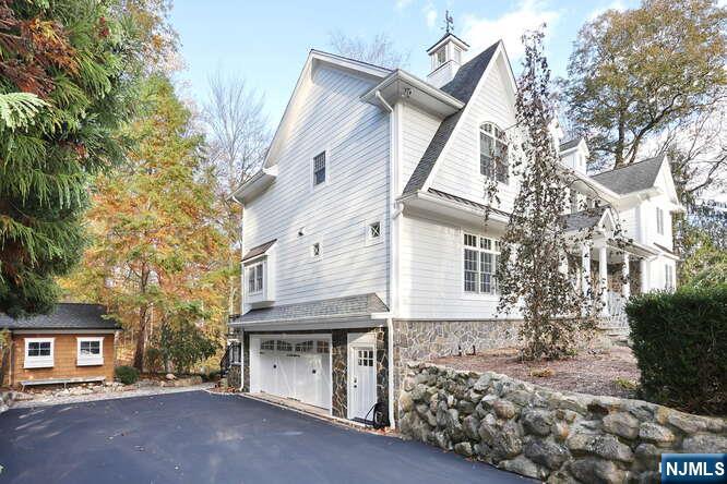 164 Deerhaven Road Mahwah, NJ 07430 - Photo 7 of 42 a view of a house with a street