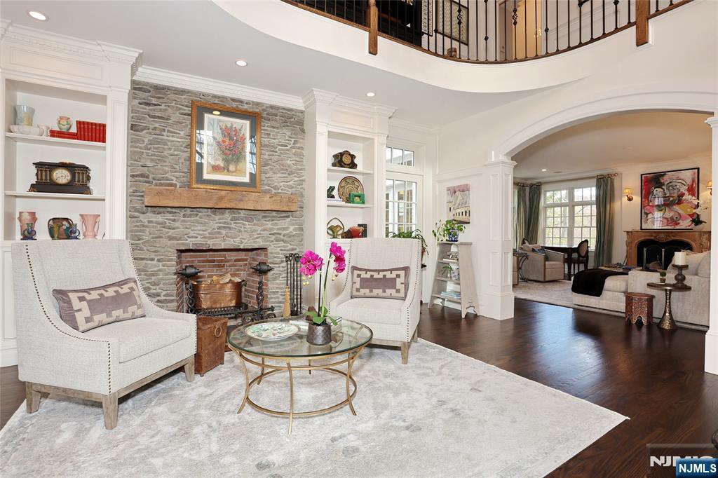 164 Deerhaven Road Mahwah, NJ 07430 - Photo 9 of 42 a living room with furniture and a fireplace