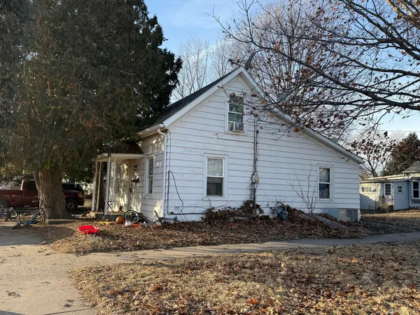 a house view with a backyard space