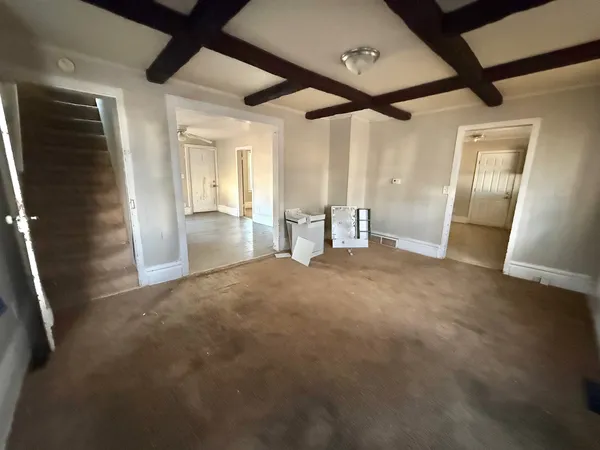 a kitchen with a stove and a refrigerator