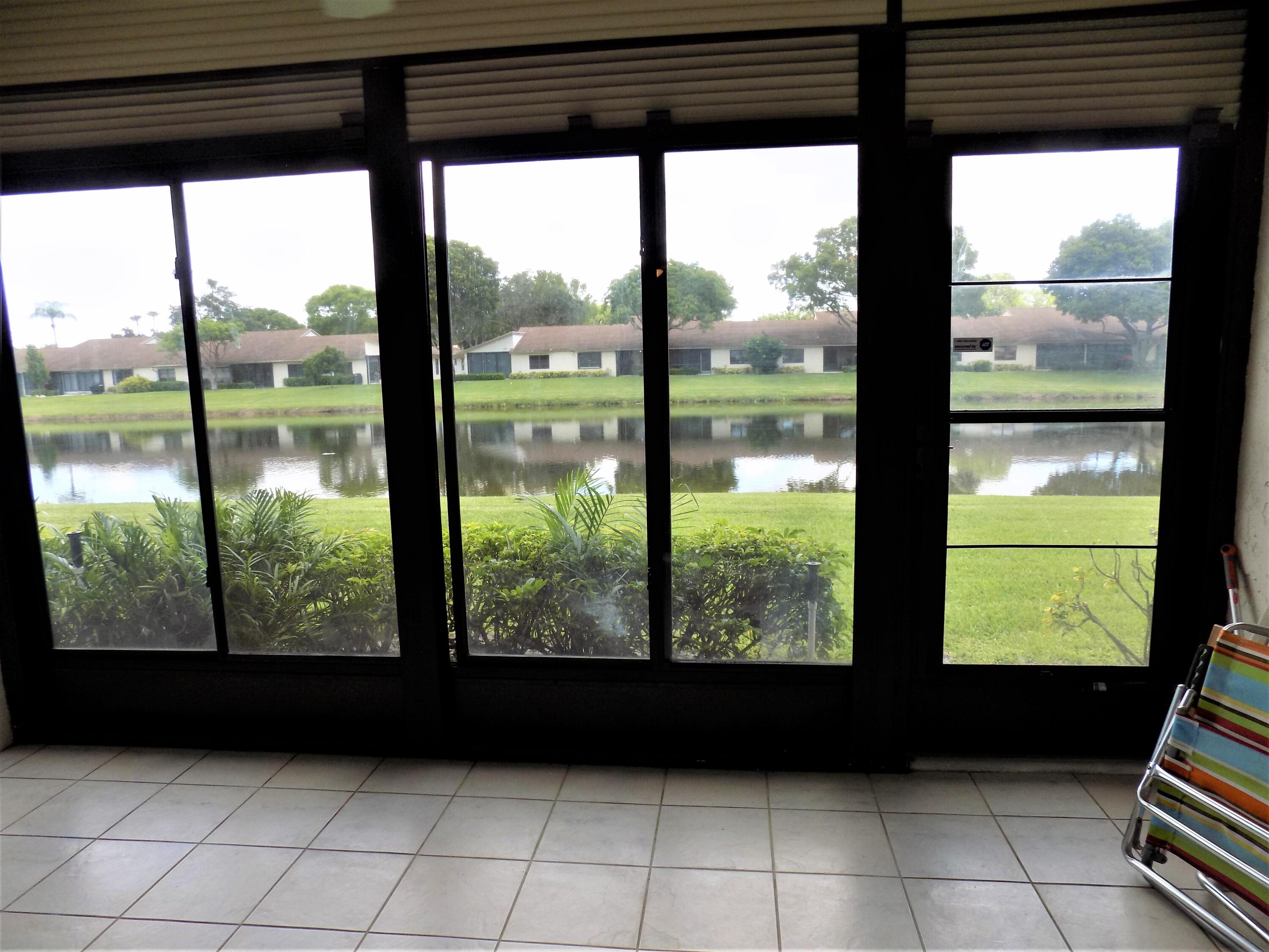 8059 Hiddenview Terrace Boca Raton, FL 33496 - Photo 13 of 39 FLA RM LAKE VIEW 1