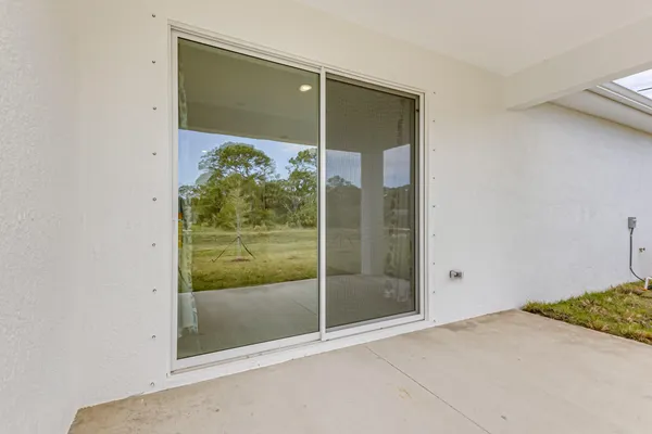a view of a room that has a sliding door