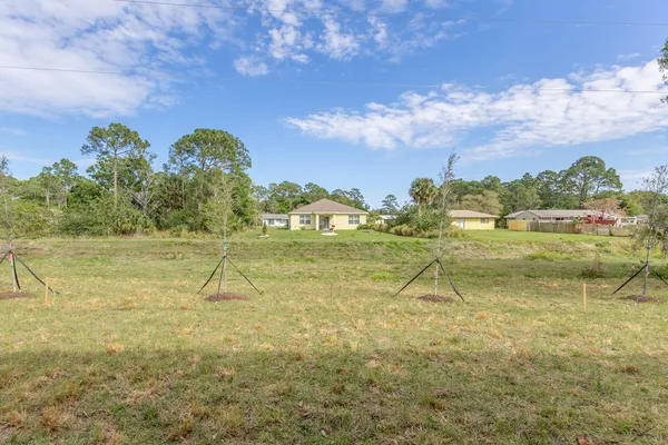 a view of a lake with a yard