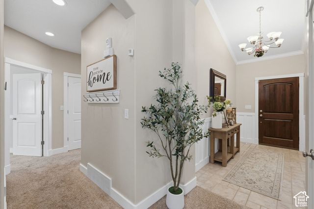 1447 Meadow Lane Mapleton, UT 84664 - Photo 17 of 67 Varnished wood-finish entry door, tiled flooring, vaulted ceiling, and recessed lighting