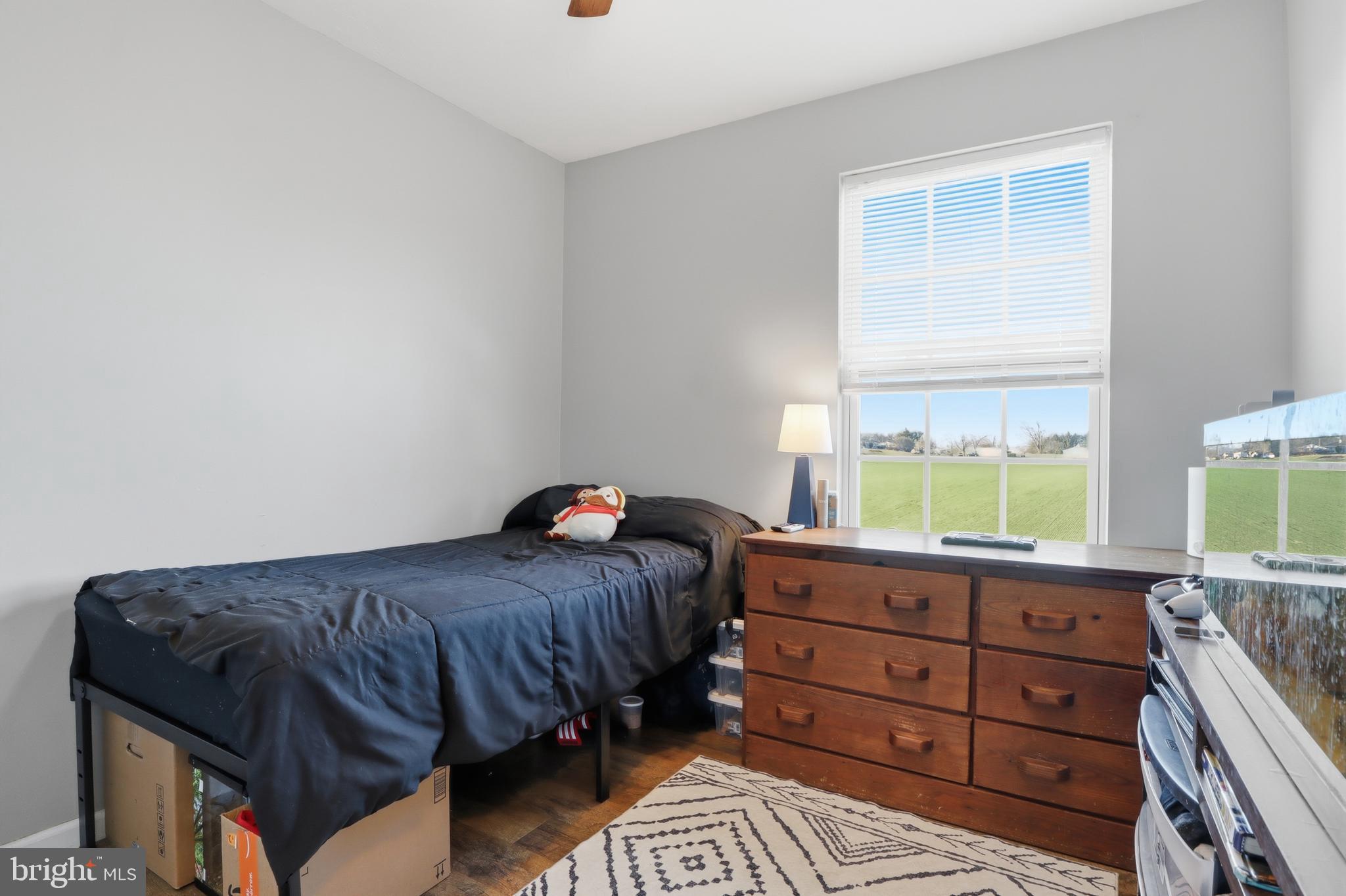 348 Cape Climb York, PA 17408 - Photo 18 of 29 a bedroom with a bed and a window