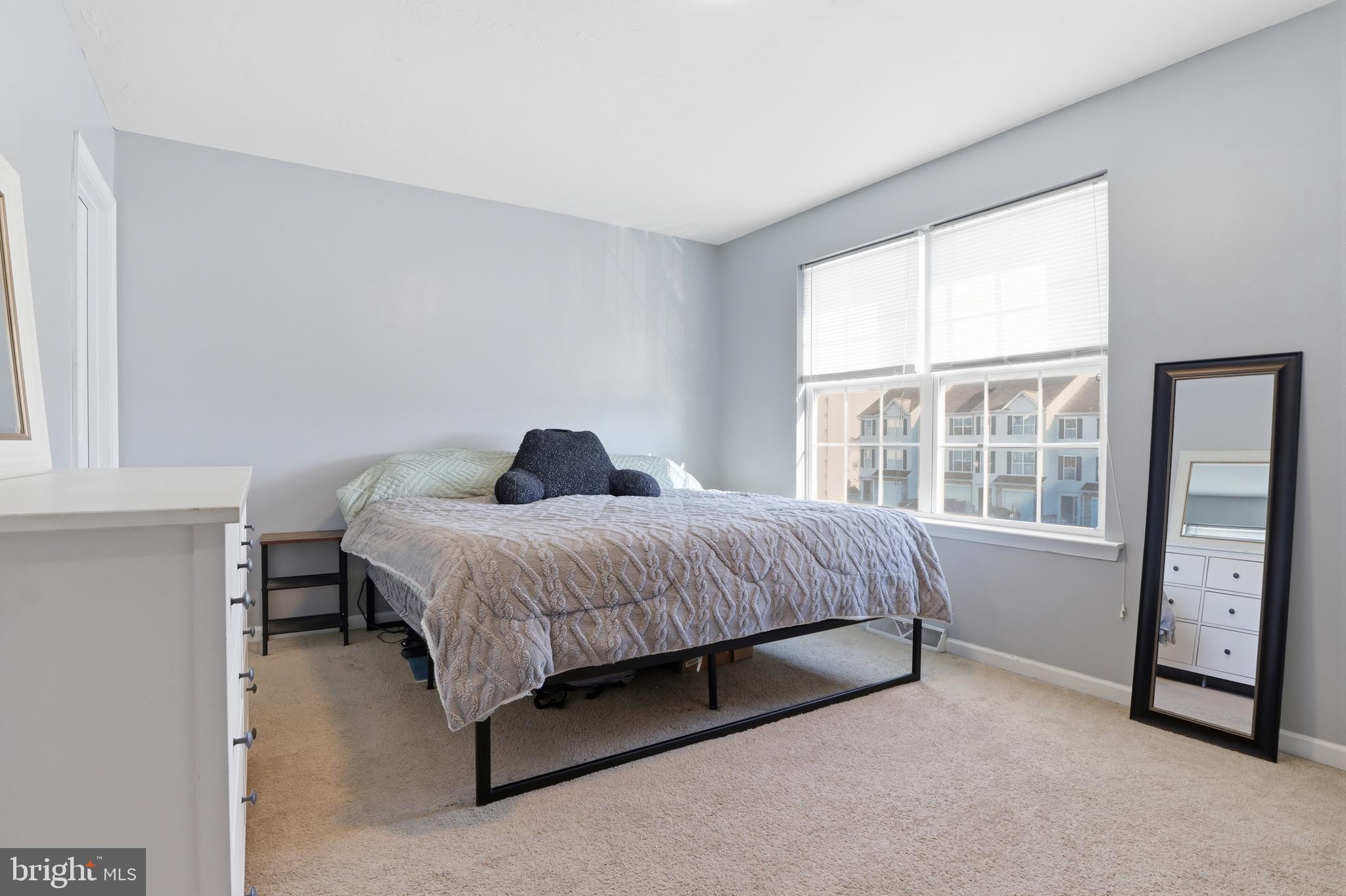 348 Cape Climb York, PA 17408 - Photo 21 of 29 a bedroom with a bed and a window