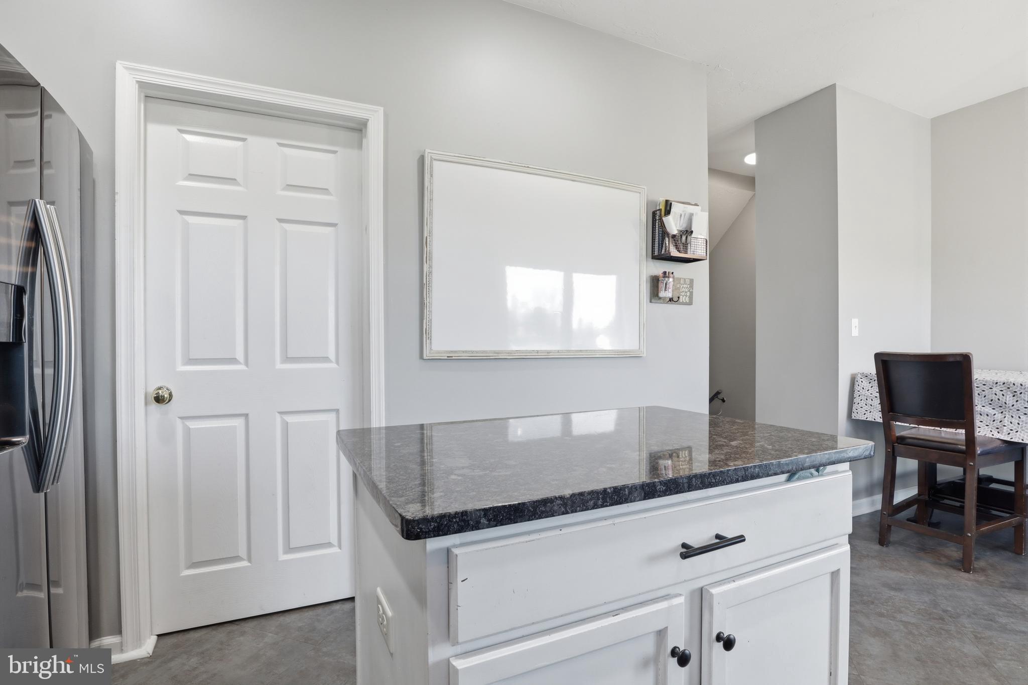 348 Cape Climb York, PA 17408 - Photo 9 of 29 a bathroom with a granite countertop sink and a mirror