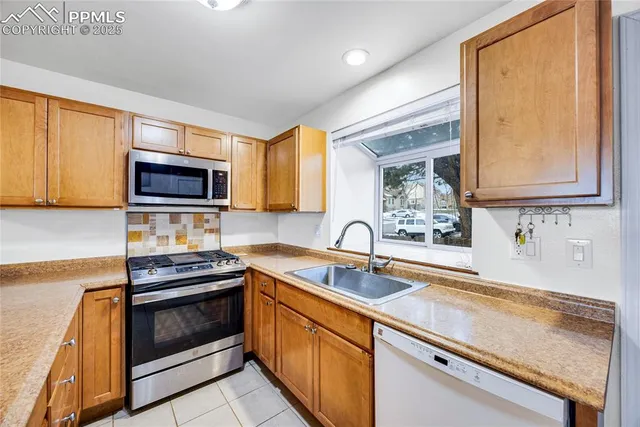a view of an entryway with chandelier