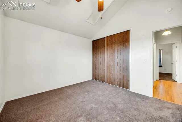 a view of a hallway with washer and dryer