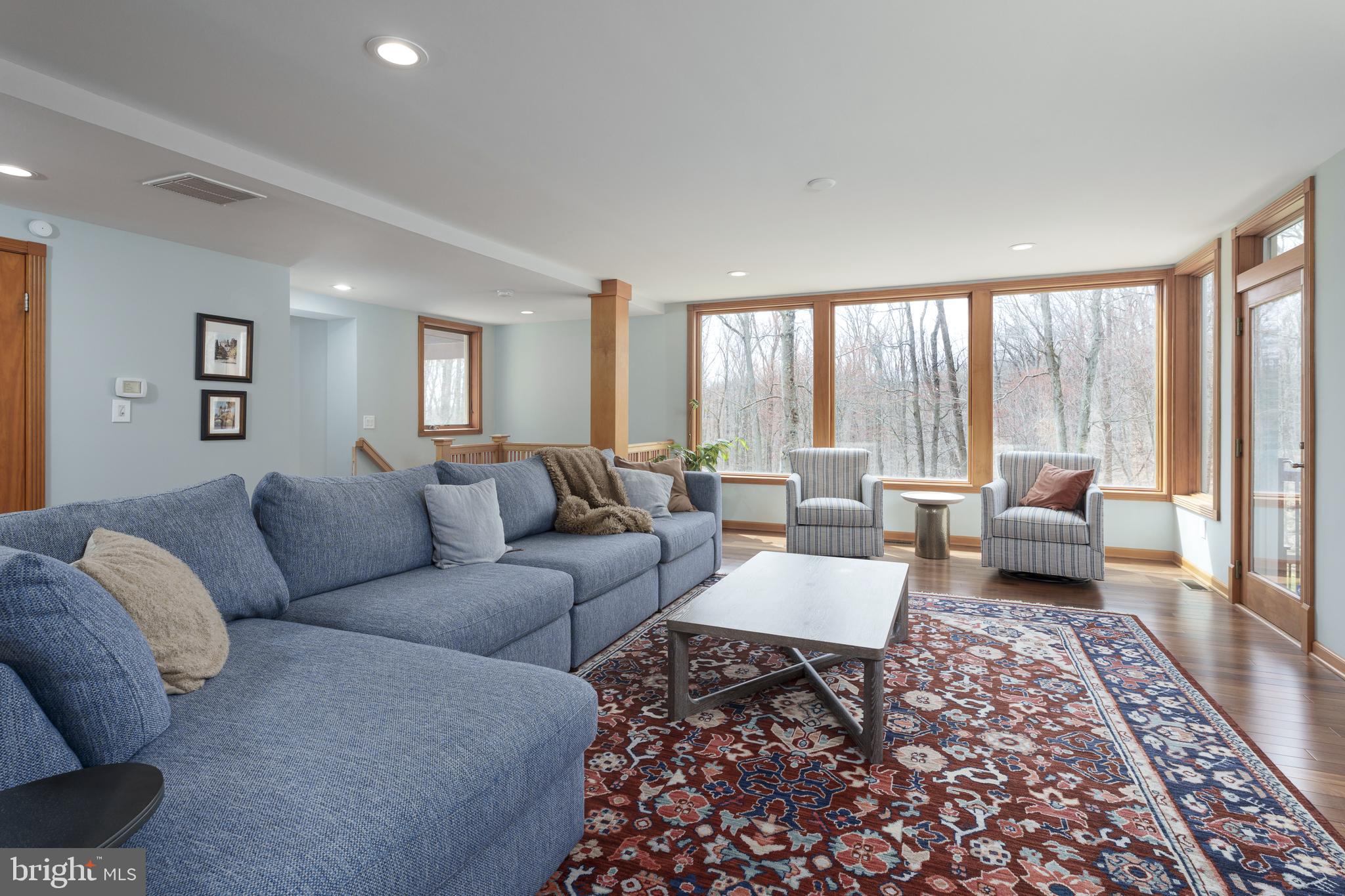 298 Hopewell Amwell Road Hopewell, NJ 08525 - Photo 11 of 51 a living room with furniture or couch and a large window