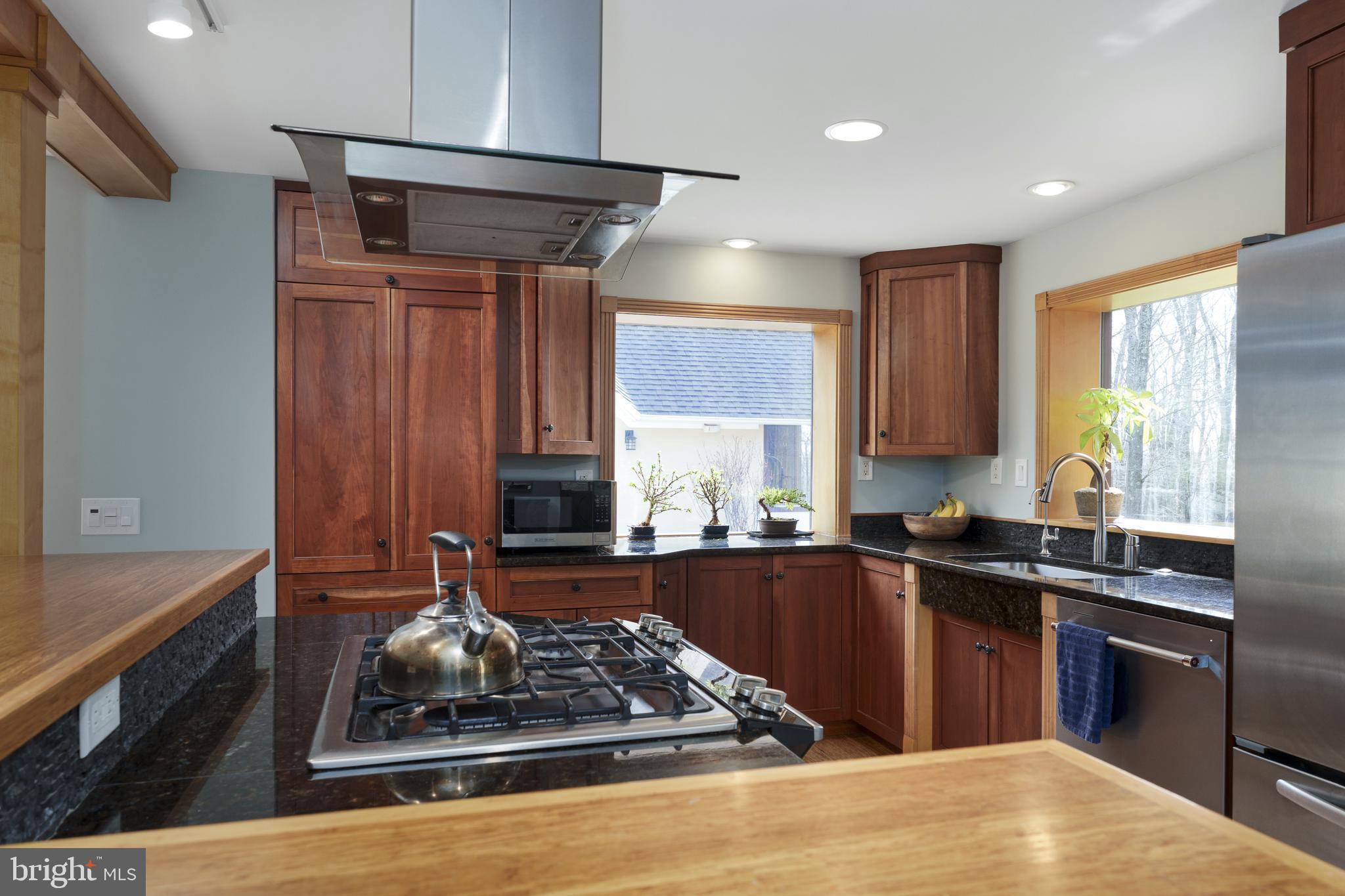 298 Hopewell Amwell Road Hopewell, NJ 08525 - Photo 19 of 51 a kitchen with a sink stove and refrigerator
