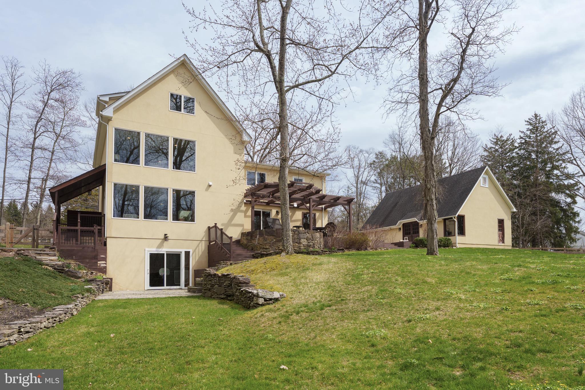 298 Hopewell Amwell Road Hopewell, NJ 08525 - Photo 3 of 51 a view of a house with a yard