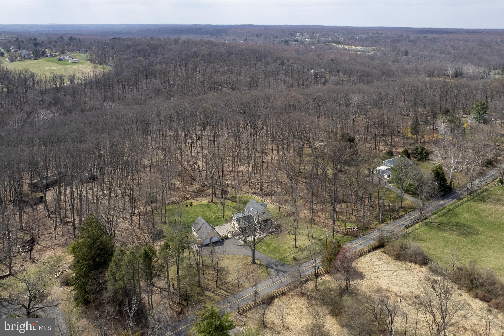 298 Hopewell Amwell Road Hopewell, NJ 08525 - Photo 4 of 51 a view of a bunch of trees and bushes