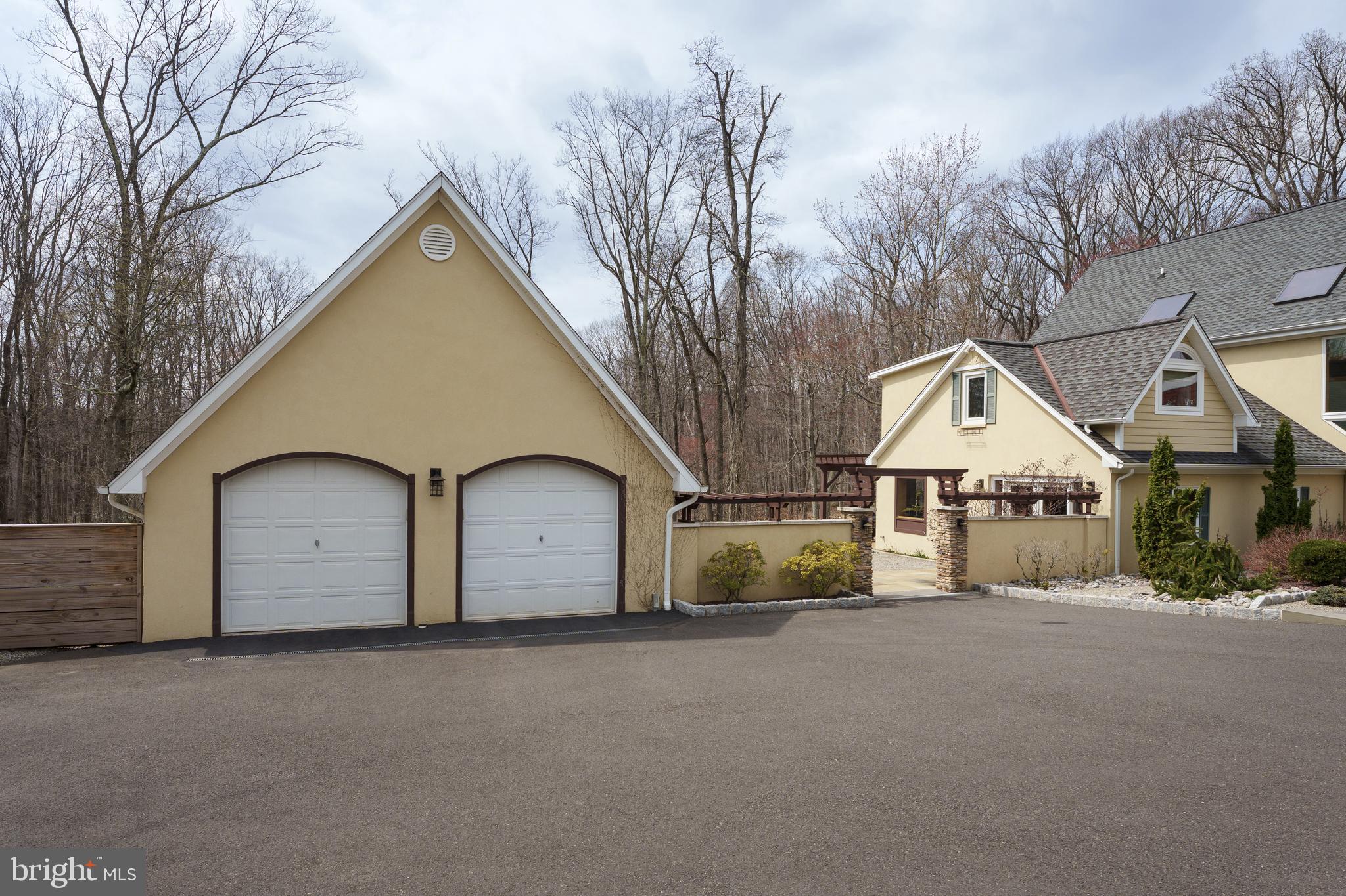 298 Hopewell Amwell Road Hopewell, NJ 08525 - Photo 43 of 51 a view of a house with a large tree in front of it