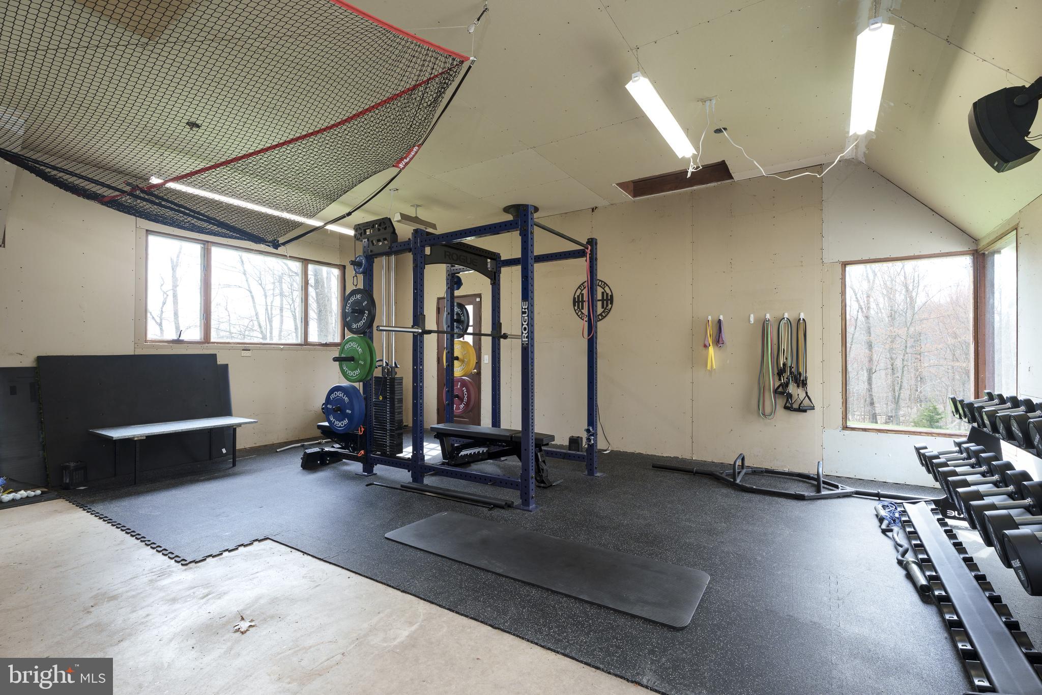 298 Hopewell Amwell Road Hopewell, NJ 08525 - Photo 44 of 51 a view of a room with gym equipment