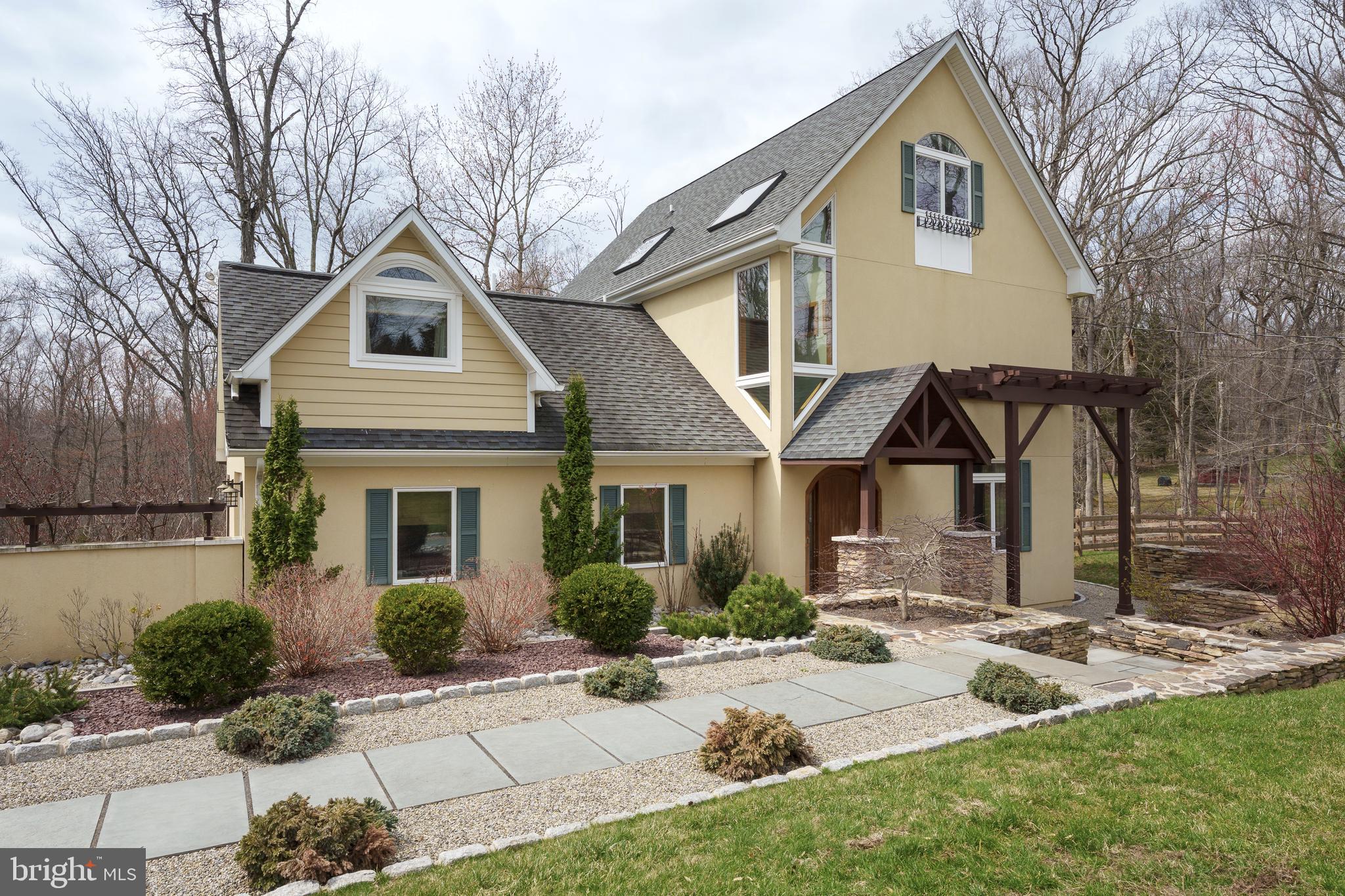 298 Hopewell Amwell Road Hopewell, NJ 08525 - Photo 6 of 51 a front view of a house with yard and green space
