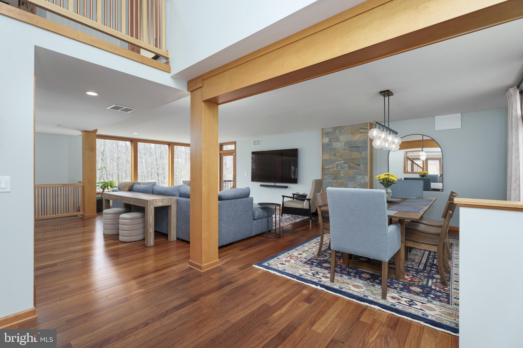 298 Hopewell Amwell Road Hopewell, NJ 08525 - Photo 9 of 51 a living room with furniture a dining table and chairs with wooden floor