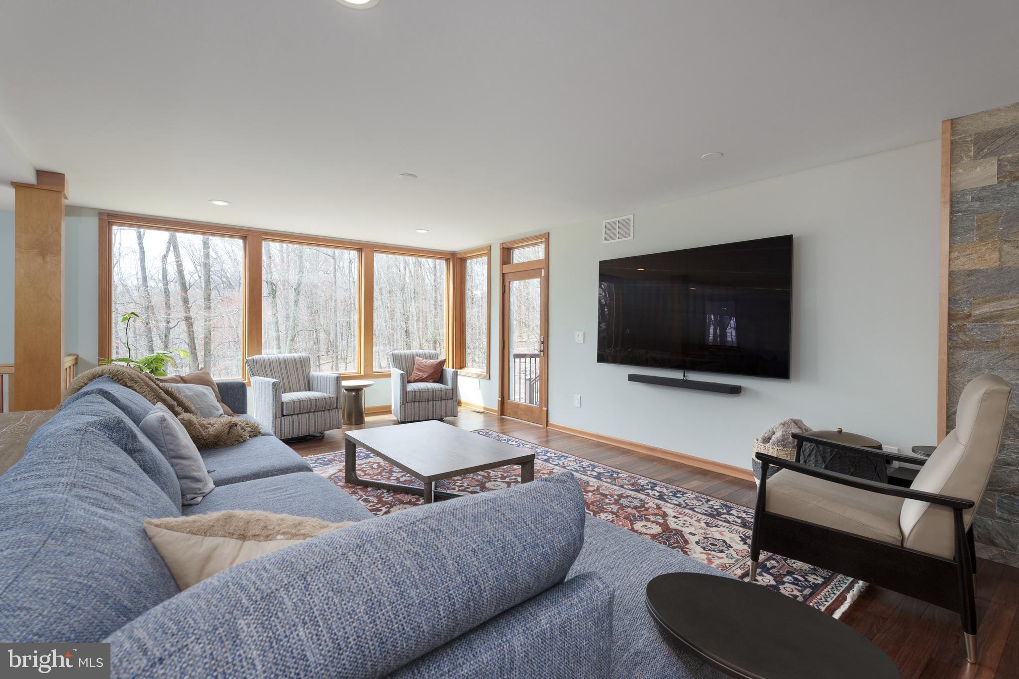 298 Hopewell Amwell Road Hopewell, NJ 08525 - Photo 10 of 51 a living room with furniture and a flat screen tv