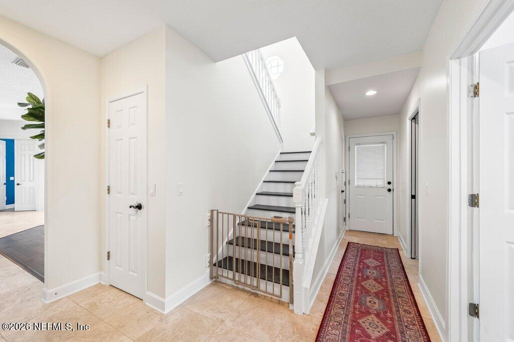 205 Royal Tern Road North Ponte Vedra Beach, FL 32082 - Photo 37 of 85 Stairway & Hallway to Laundry and Garage