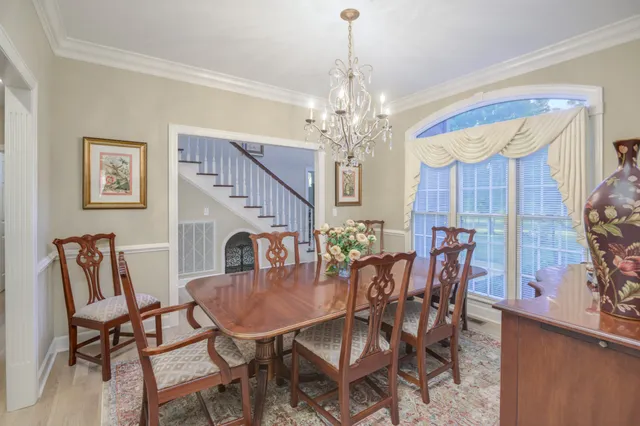 a kitchen with a sink stove and microwave